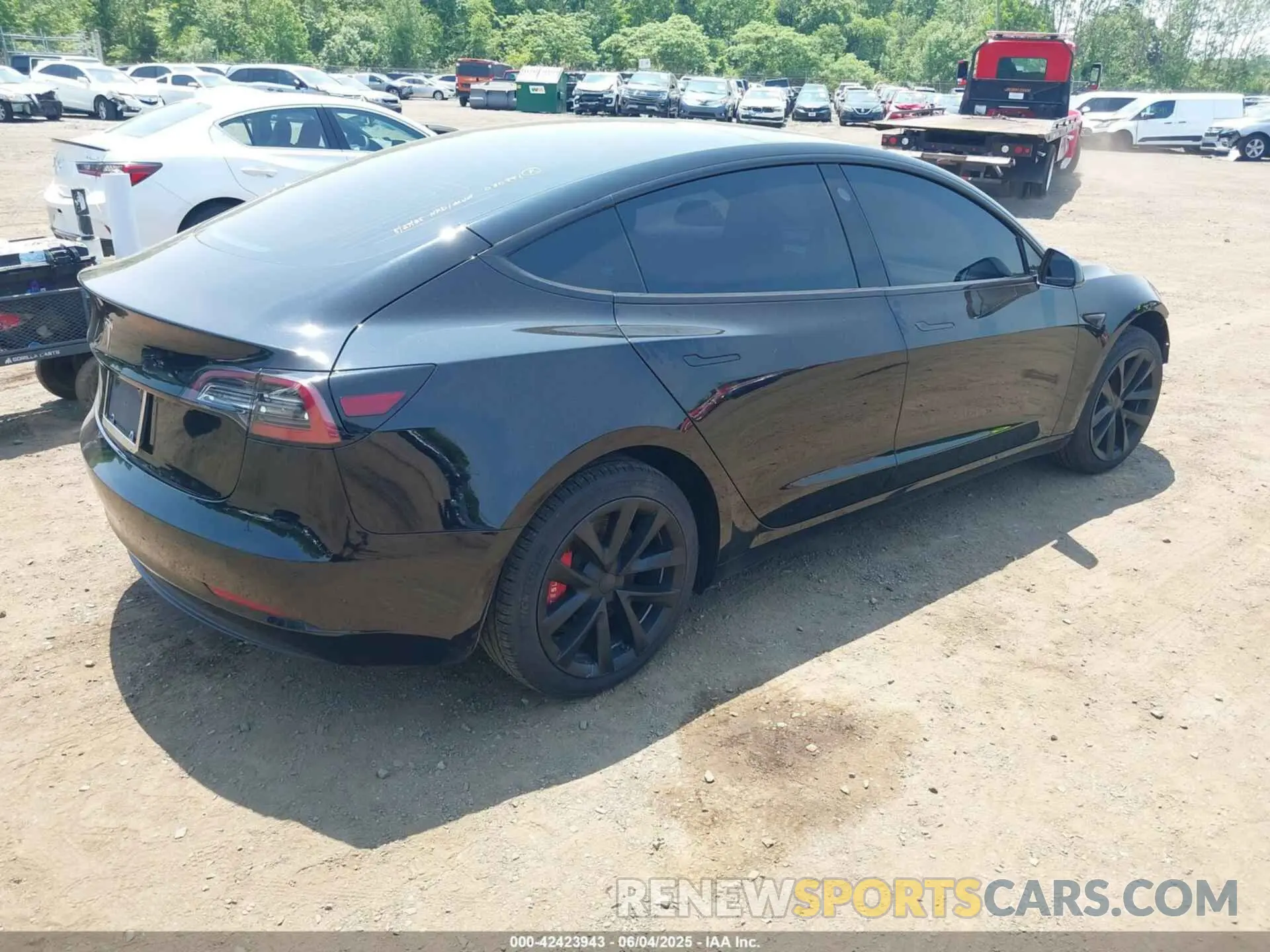 4 Photograph of a damaged car 5YJ3E1EA2LF704499 TESLA MODEL 3 2020