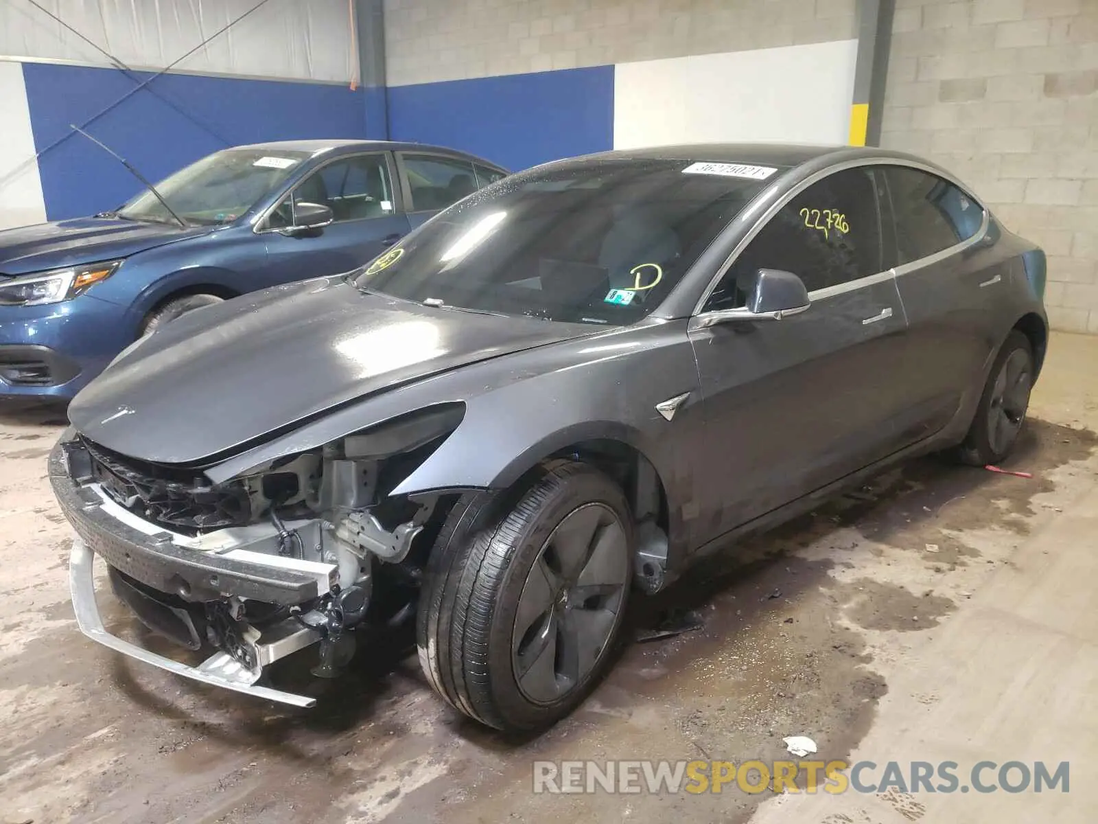 2 Photograph of a damaged car 5YJ3E1EA2LF738121 TESLA MODEL 3 2020
