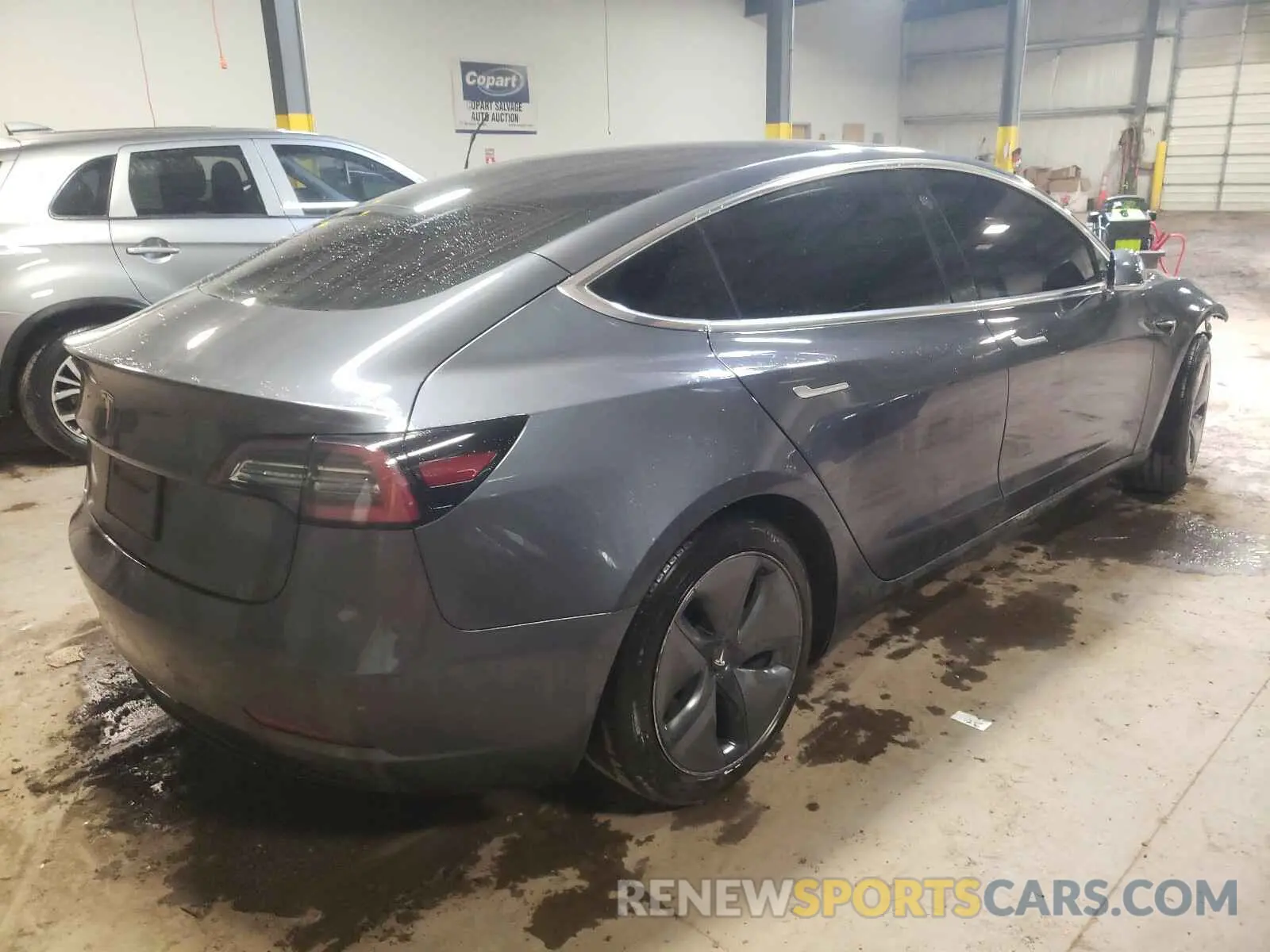 4 Photograph of a damaged car 5YJ3E1EA2LF738121 TESLA MODEL 3 2020