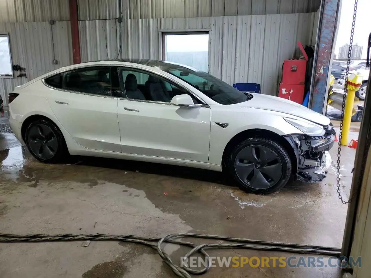 4 Photograph of a damaged car 5YJ3E1EA2LF783639 TESLA MODEL 3 2020