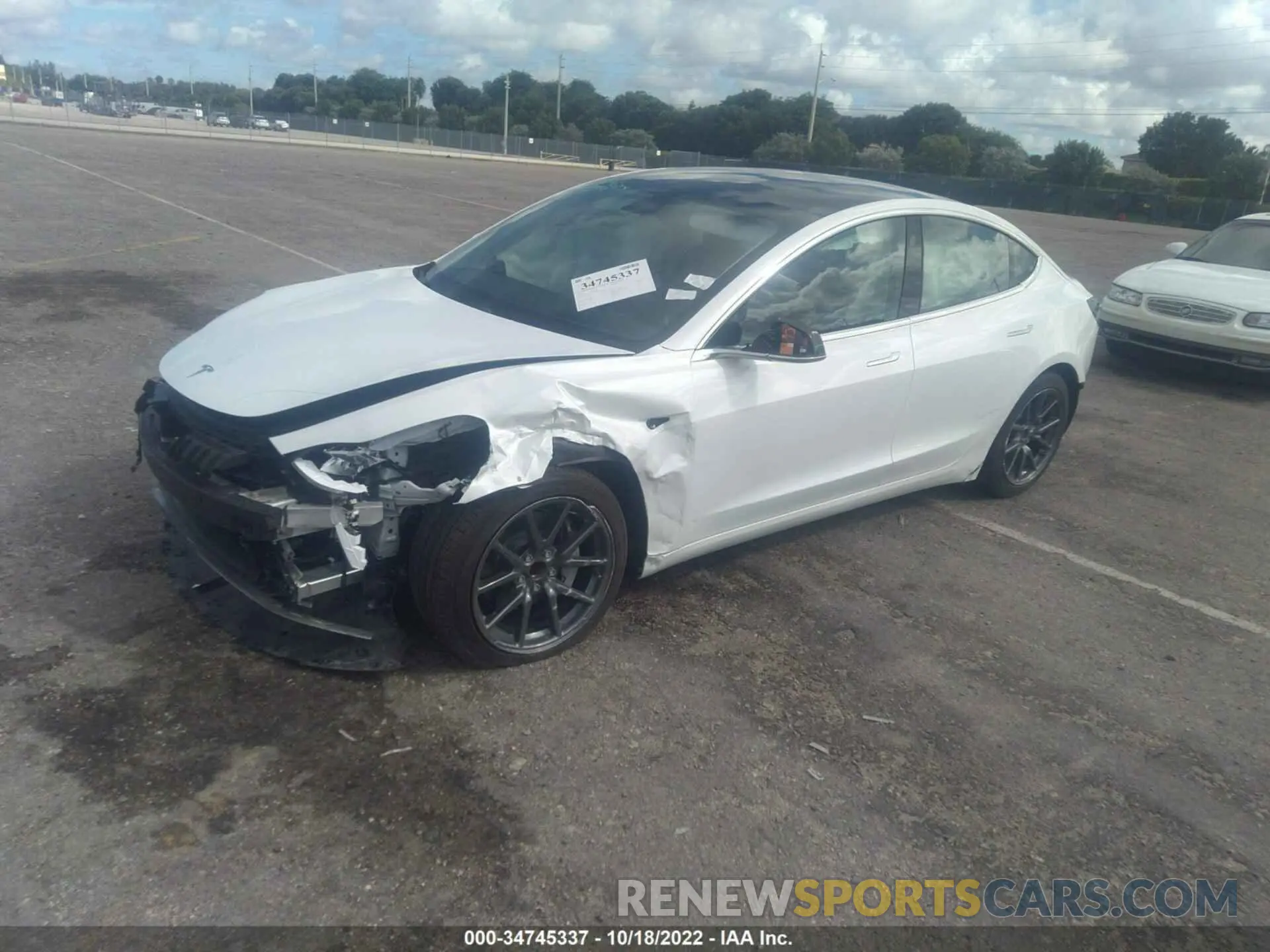 2 Photograph of a damaged car 5YJ3E1EA2LF792583 TESLA MODEL 3 2020