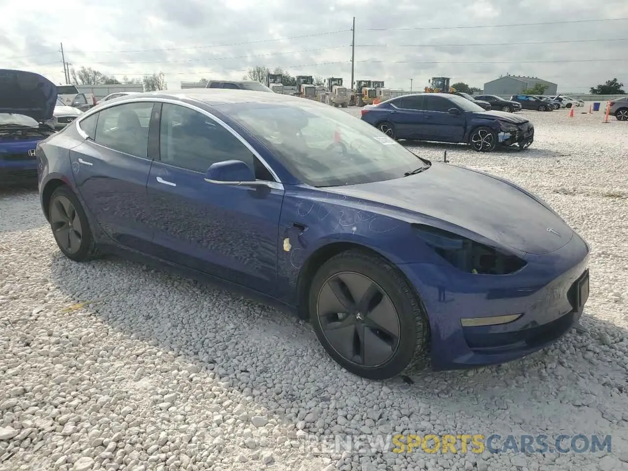4 Photograph of a damaged car 5YJ3E1EA3LF658472 TESLA MODEL 3 2020