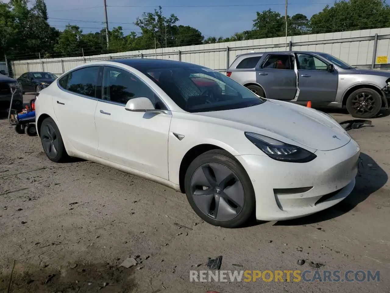 4 Photograph of a damaged car 5YJ3E1EA3LF659962 TESLA MODEL 3 2020