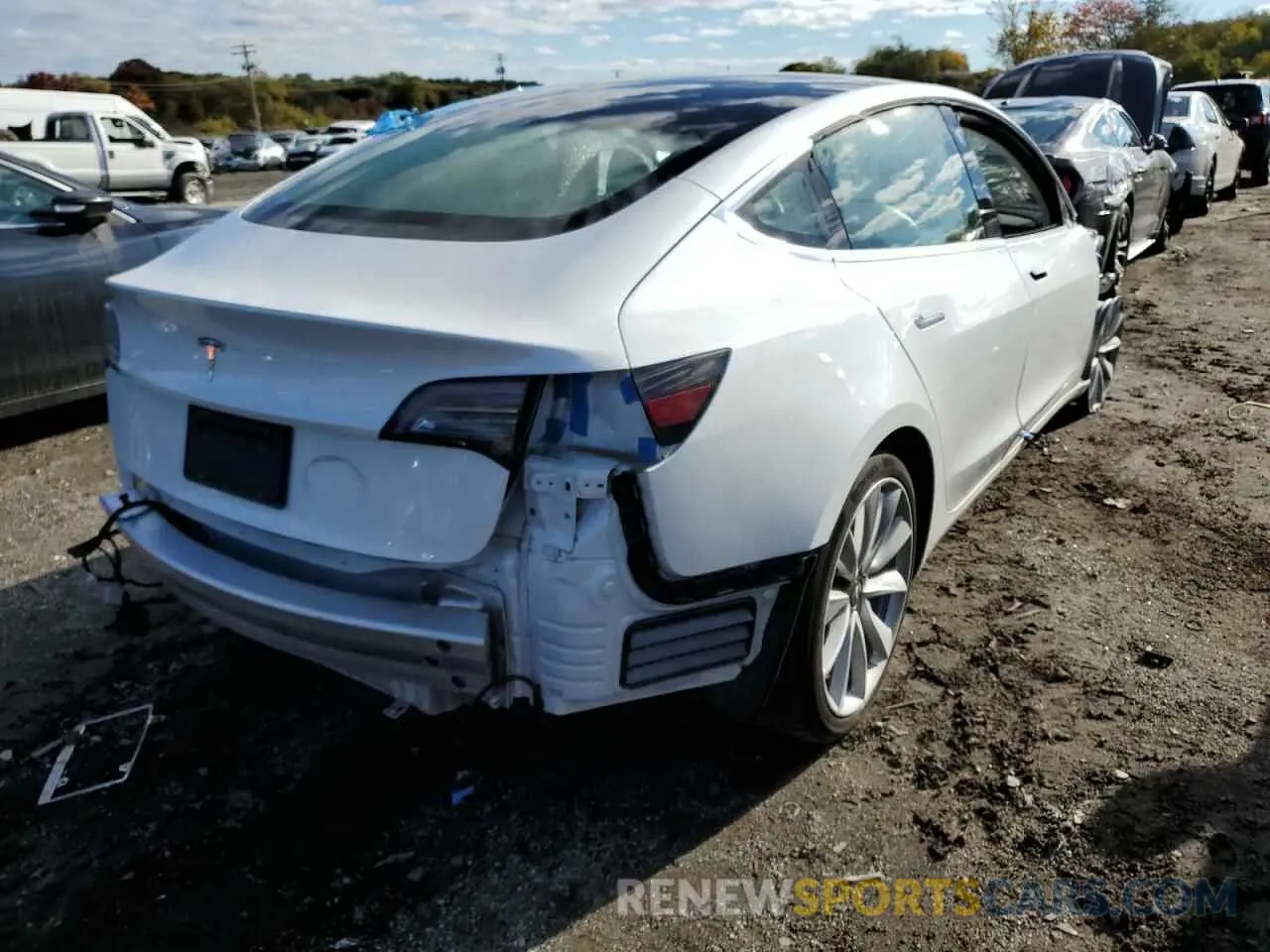4 Photograph of a damaged car 5YJ3E1EA3LF717780 TESLA MODEL 3 2020
