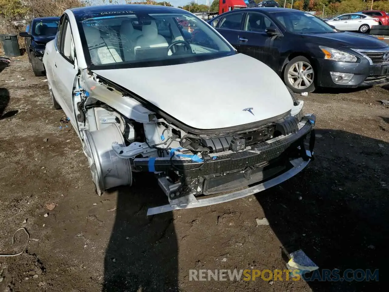 9 Photograph of a damaged car 5YJ3E1EA3LF717780 TESLA MODEL 3 2020