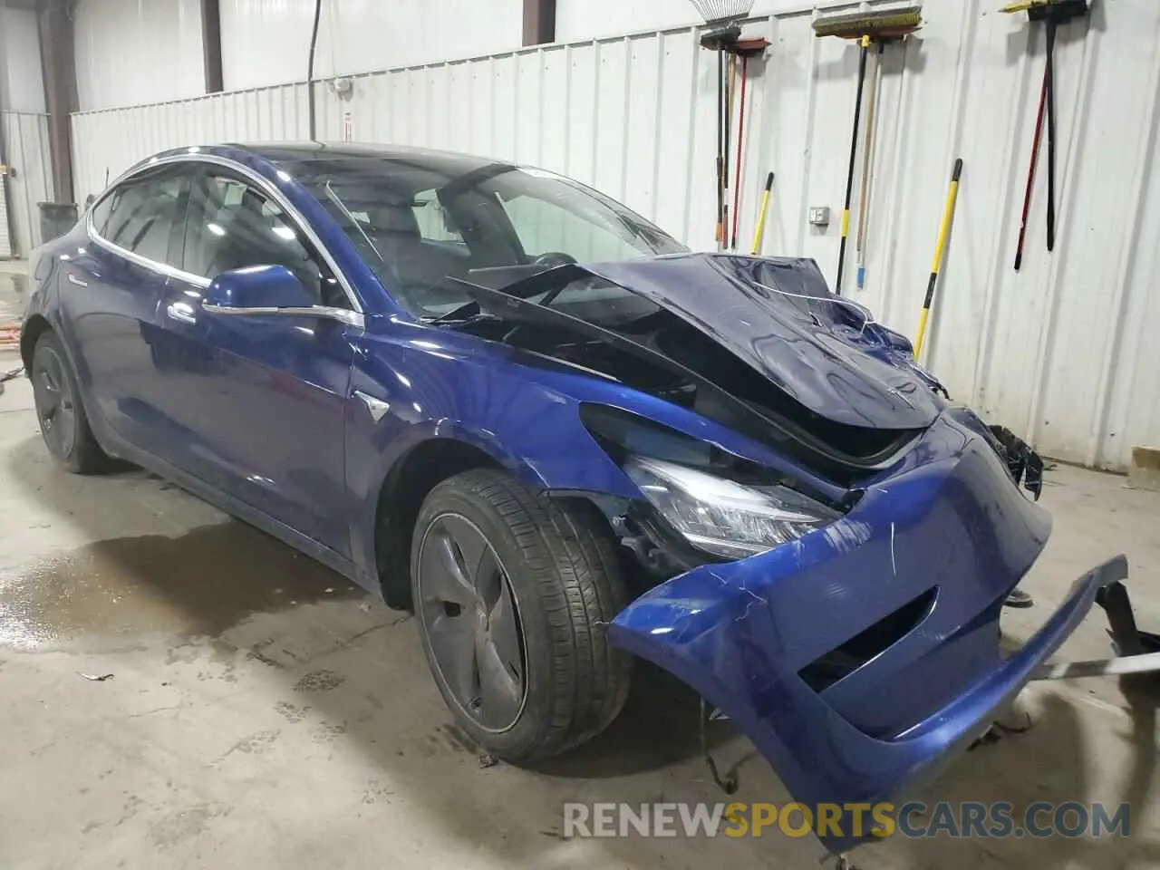 4 Photograph of a damaged car 5YJ3E1EA3LF803784 TESLA MODEL 3 2020