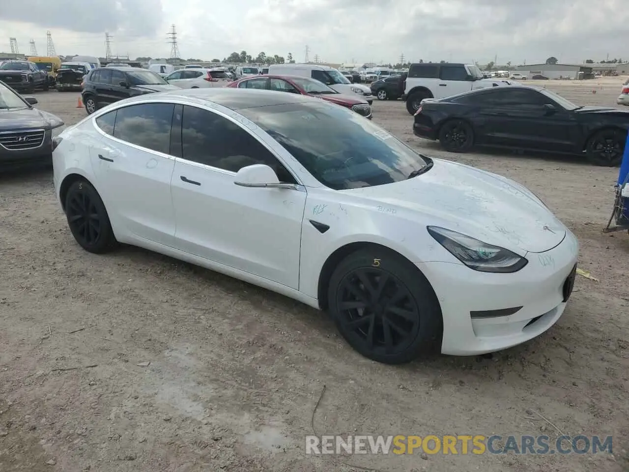 4 Photograph of a damaged car 5YJ3E1EA4LF634049 TESLA MODEL 3 2020
