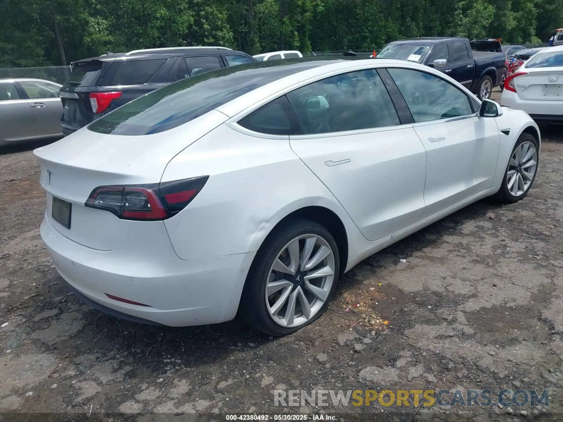 4 Photograph of a damaged car 5YJ3E1EA4LF661560 TESLA MODEL 3 2020
