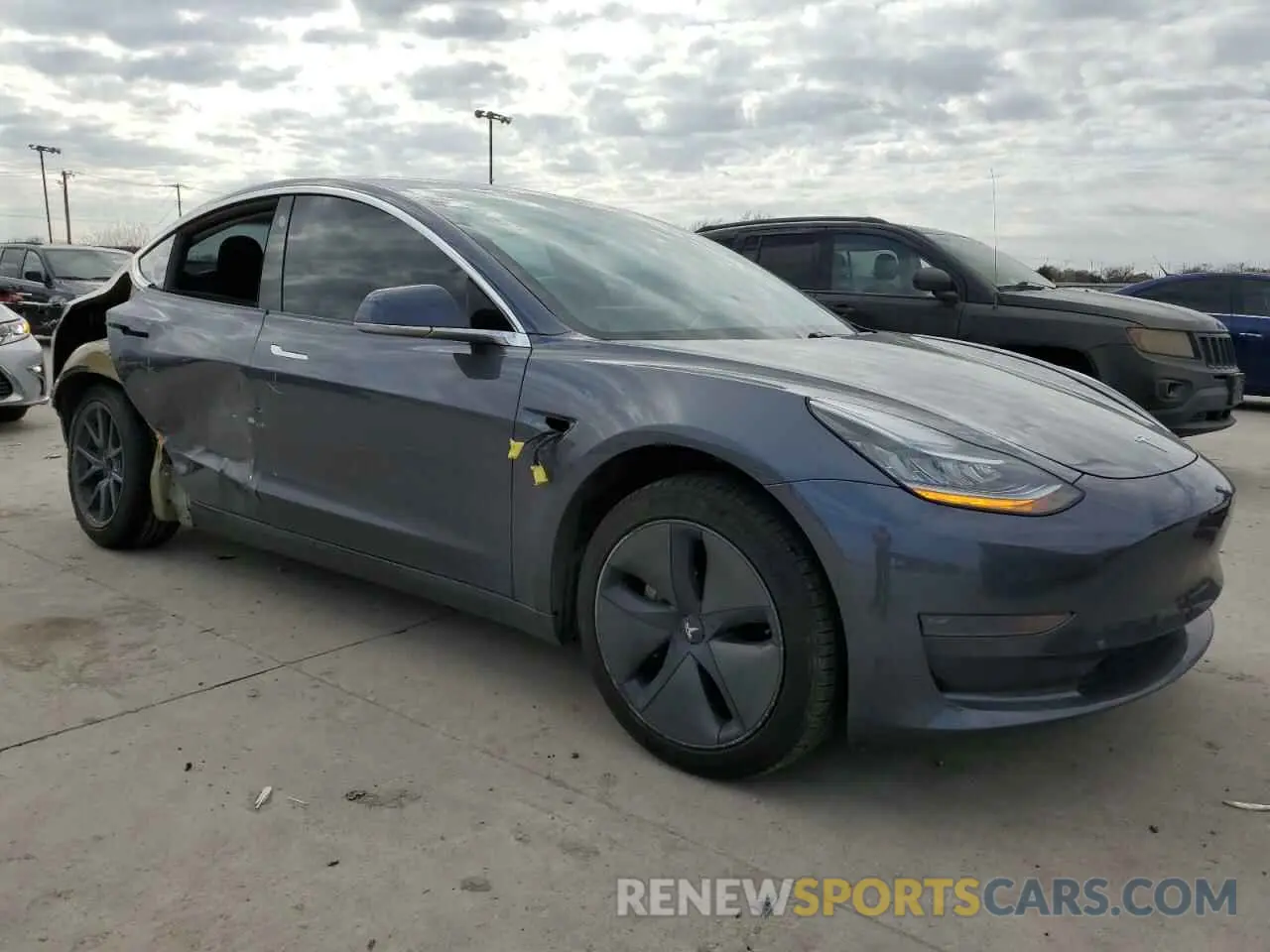 4 Photograph of a damaged car 5YJ3E1EA4LF705041 TESLA MODEL 3 2020