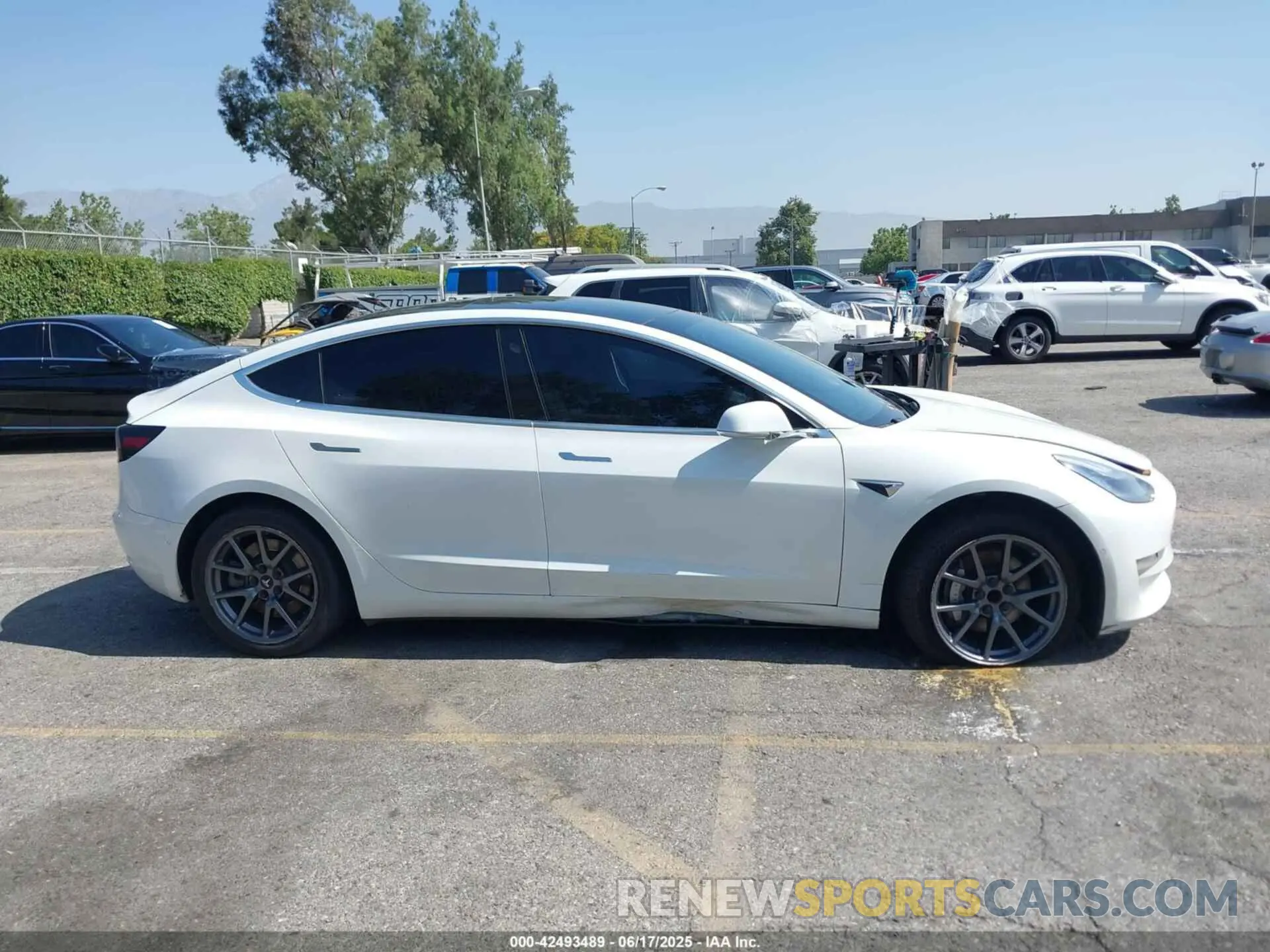 12 Photograph of a damaged car 5YJ3E1EA4LF740016 TESLA MODEL 3 2020