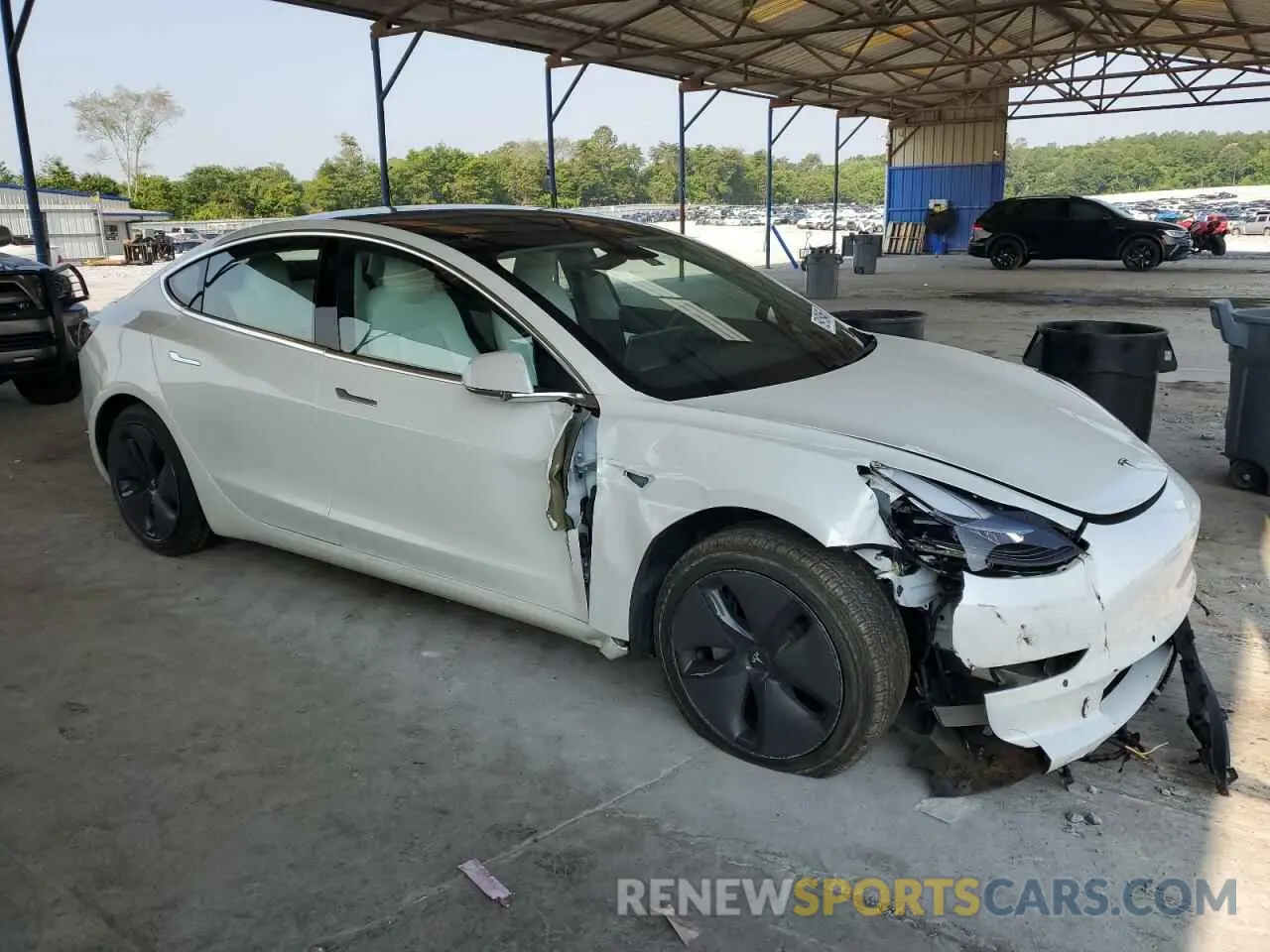 4 Photograph of a damaged car 5YJ3E1EA5LF599103 TESLA MODEL 3 2020