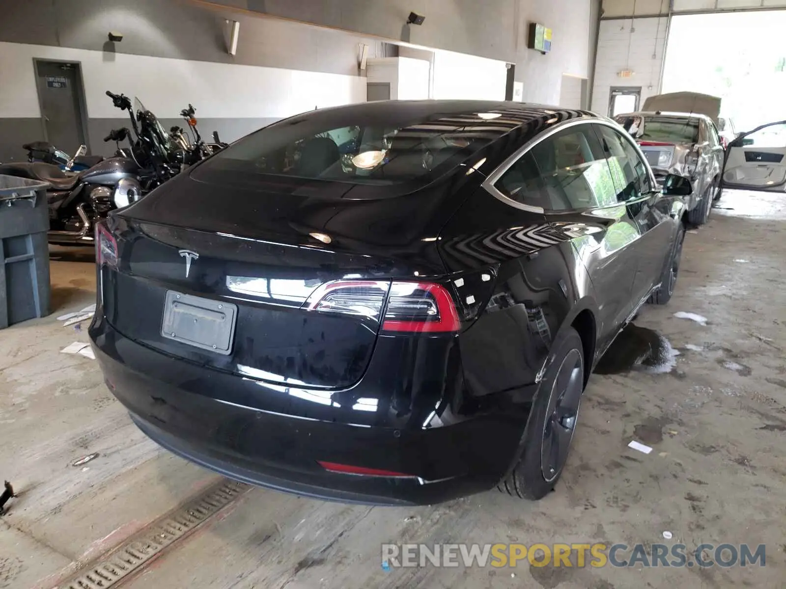 4 Photograph of a damaged car 5YJ3E1EA5LF643780 TESLA MODEL 3 2020