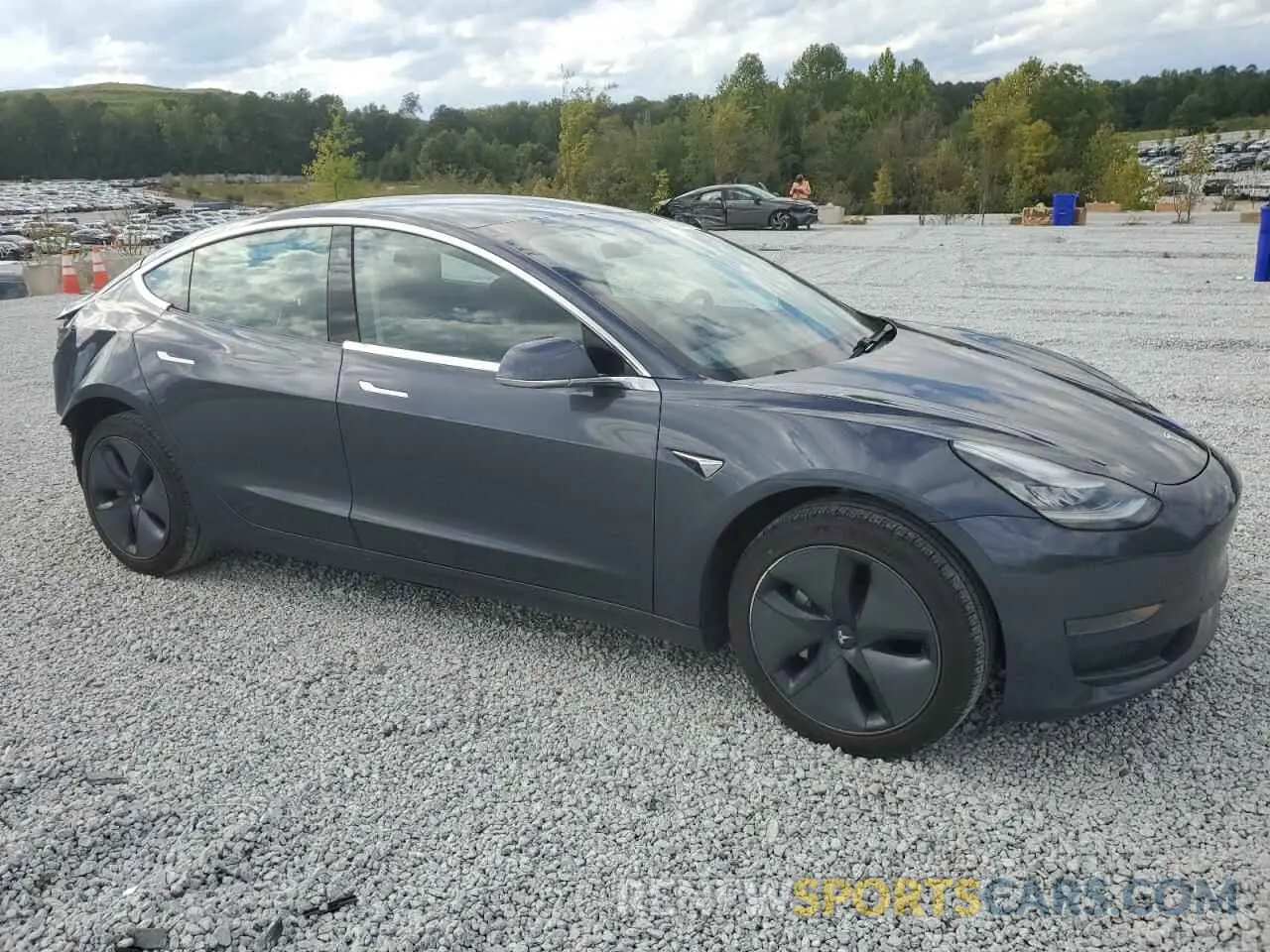 4 Photograph of a damaged car 5YJ3E1EA5LF644038 TESLA MODEL 3 2020