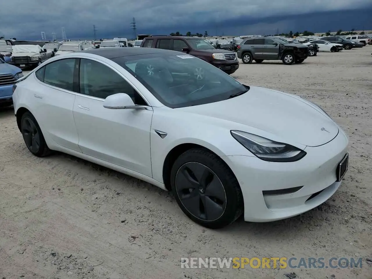 4 Photograph of a damaged car 5YJ3E1EA5LF659798 TESLA MODEL 3 2020