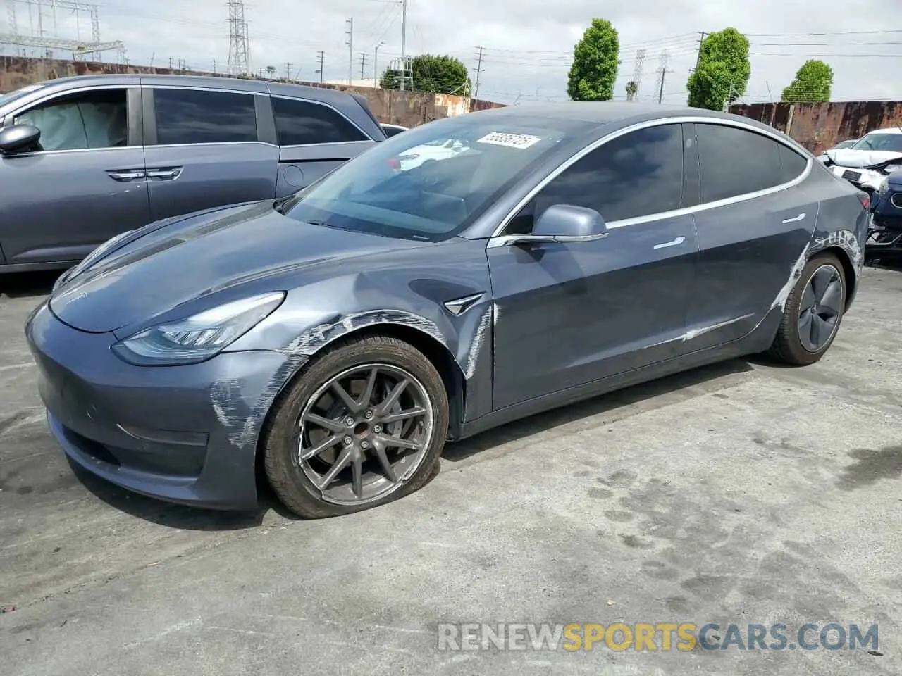 1 Photograph of a damaged car 5YJ3E1EA5LF704996 TESLA MODEL 3 2020