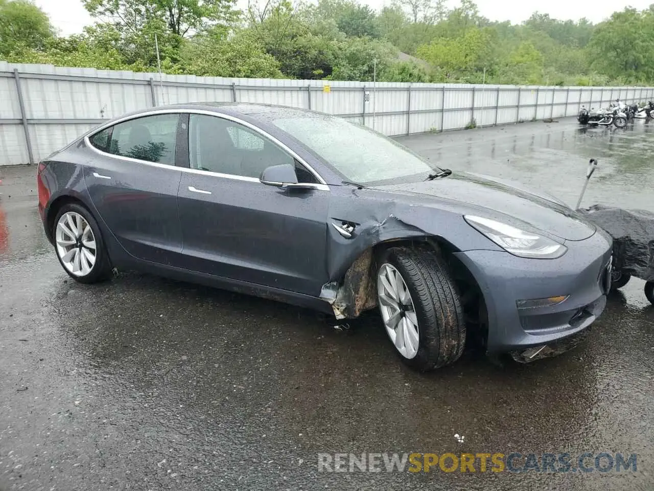 4 Photograph of a damaged car 5YJ3E1EA5LF740722 TESLA MODEL 3 2020