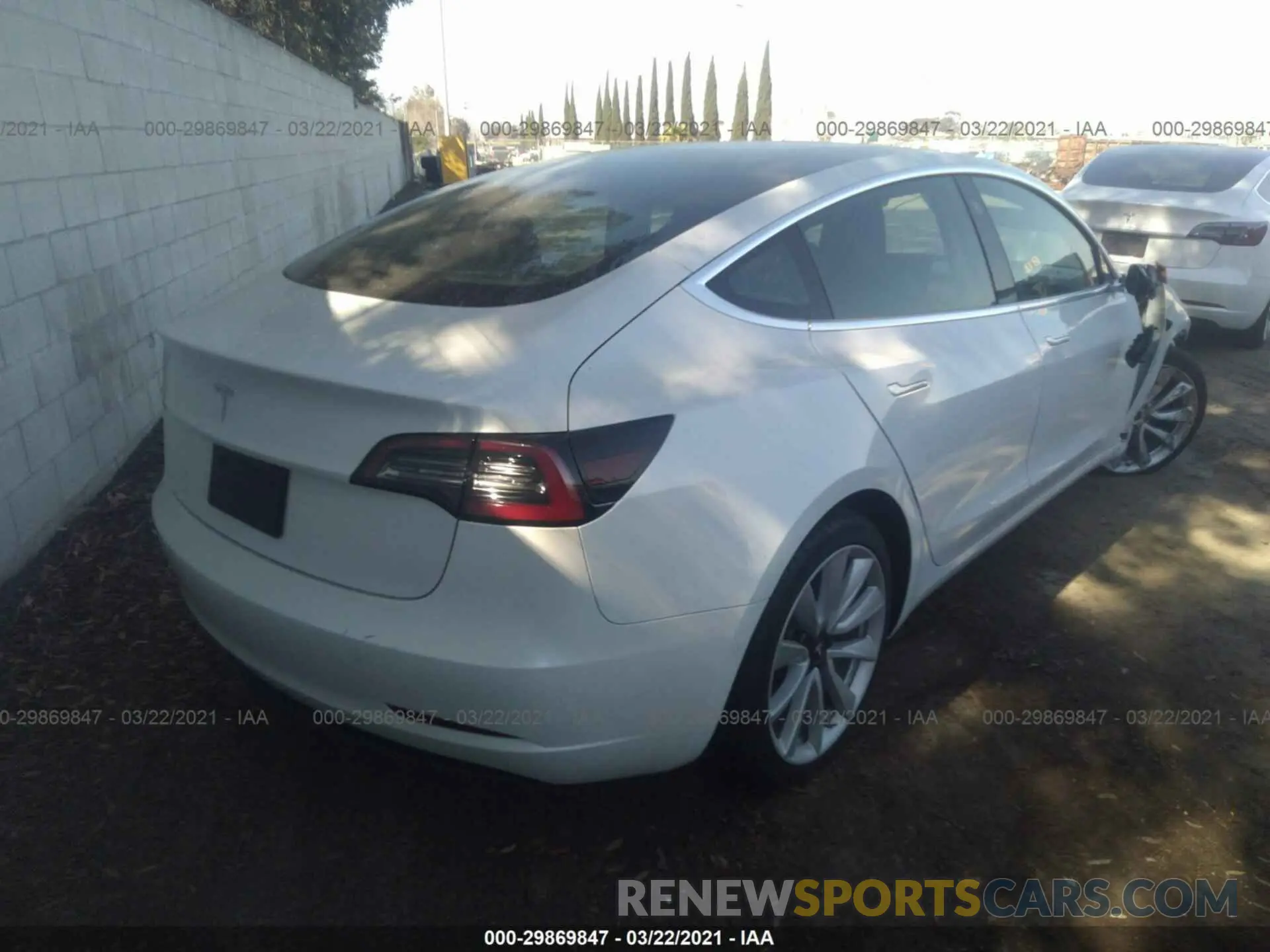 4 Photograph of a damaged car 5YJ3E1EA5LF745905 TESLA MODEL 3 2020