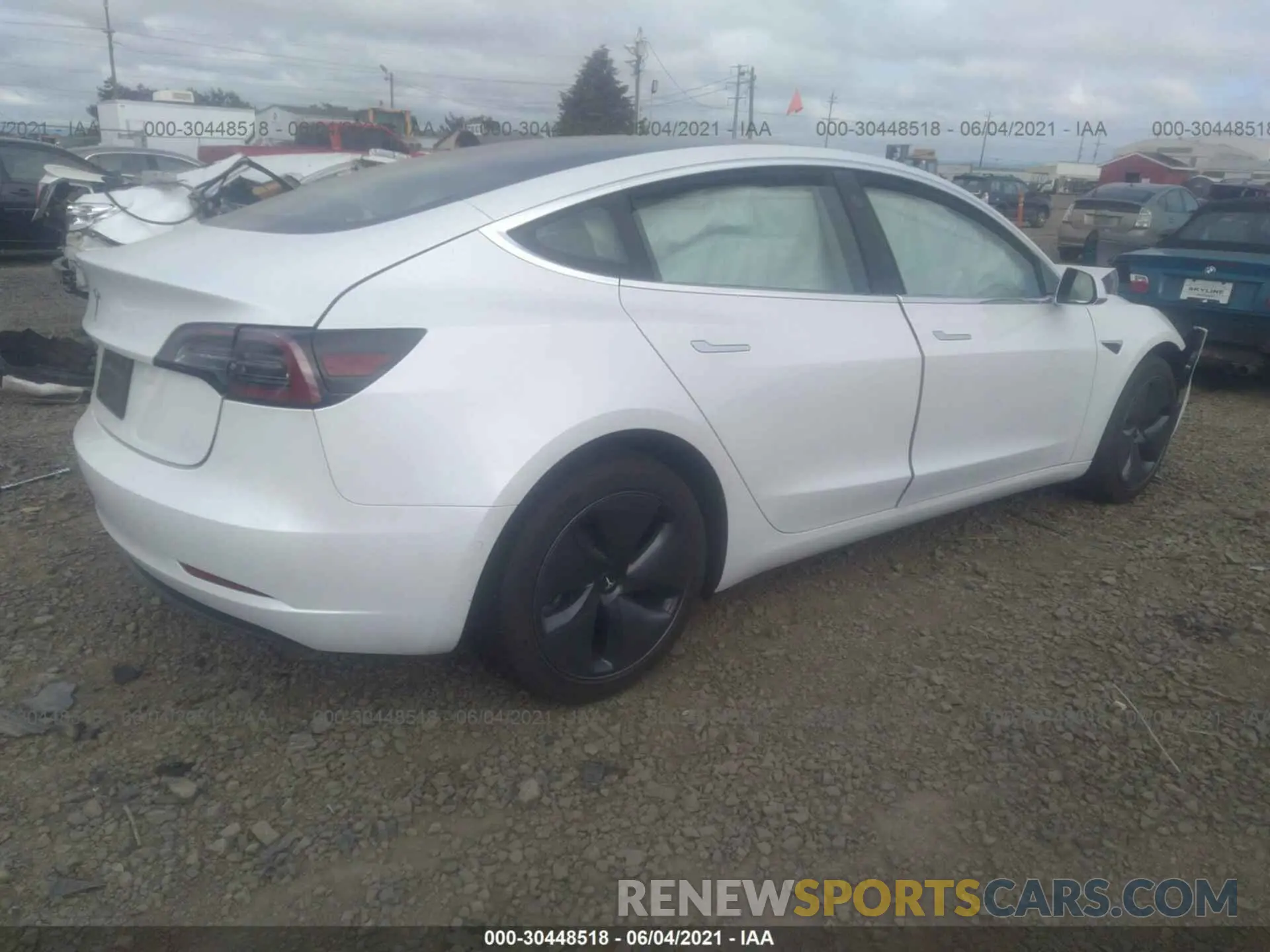 4 Photograph of a damaged car 5YJ3E1EA6LF805142 TESLA MODEL 3 2020