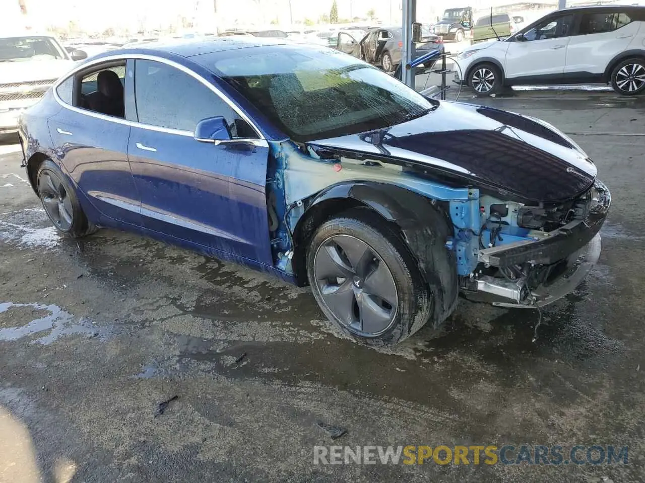 4 Photograph of a damaged car 5YJ3E1EA7LF705907 TESLA MODEL 3 2020