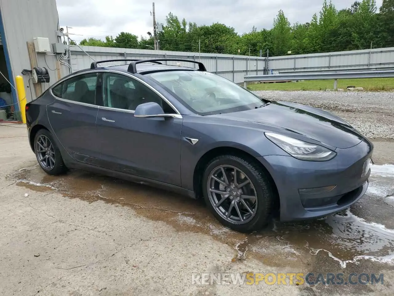 4 Photograph of a damaged car 5YJ3E1EA7LF745601 TESLA MODEL 3 2020