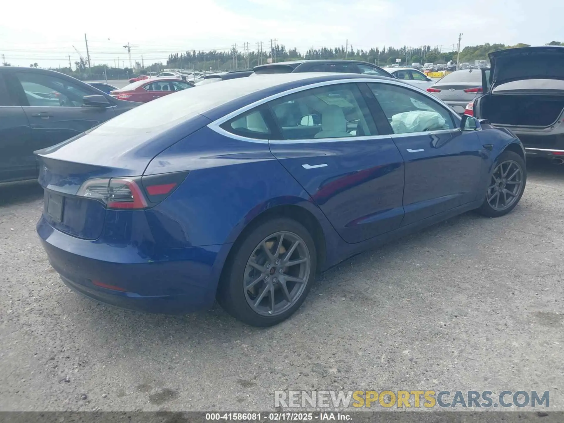 4 Photograph of a damaged car 5YJ3E1EA7LF785838 TESLA MODEL 3 2020