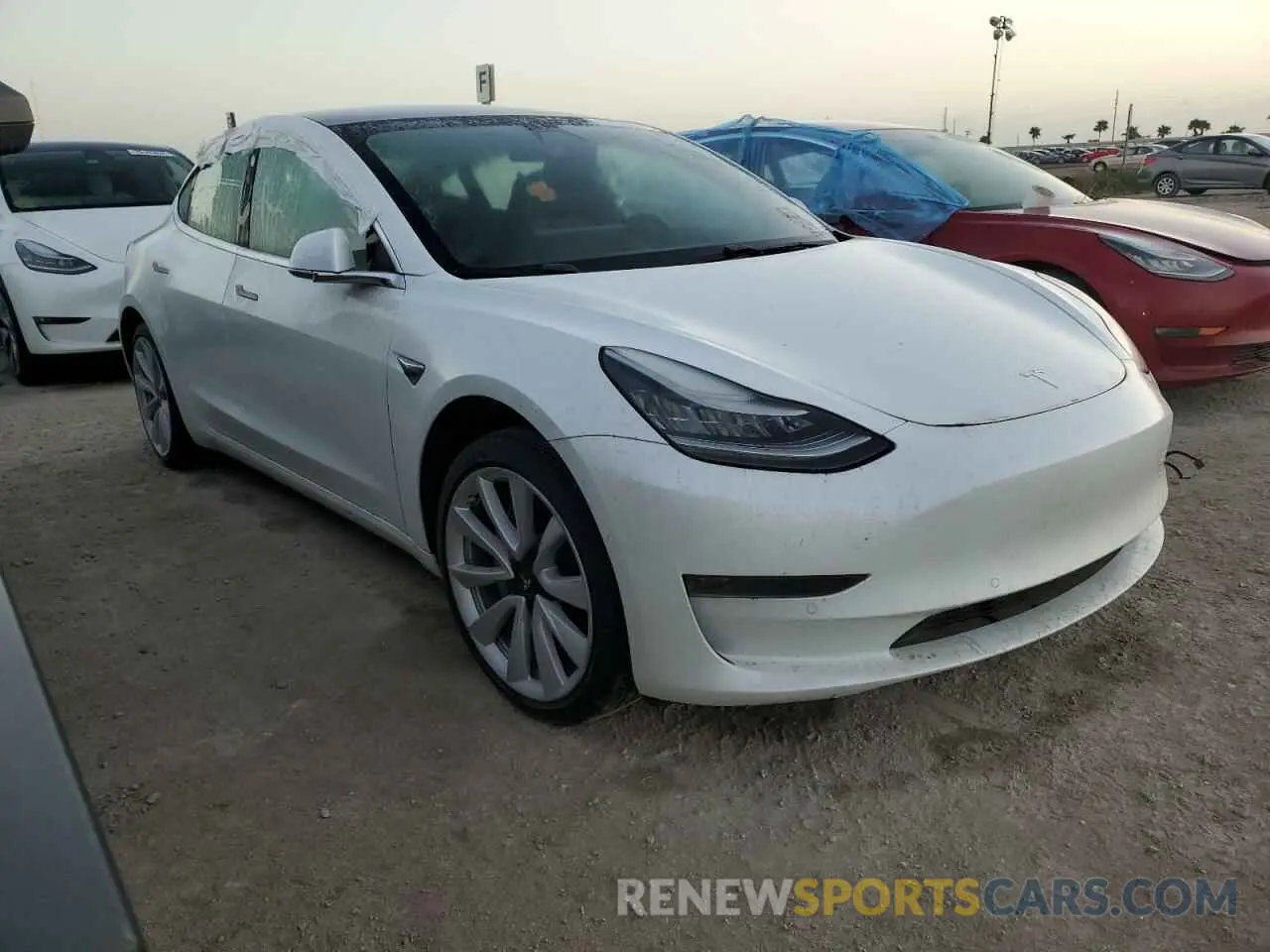 4 Photograph of a damaged car 5YJ3E1EA8LF598690 TESLA MODEL 3 2020