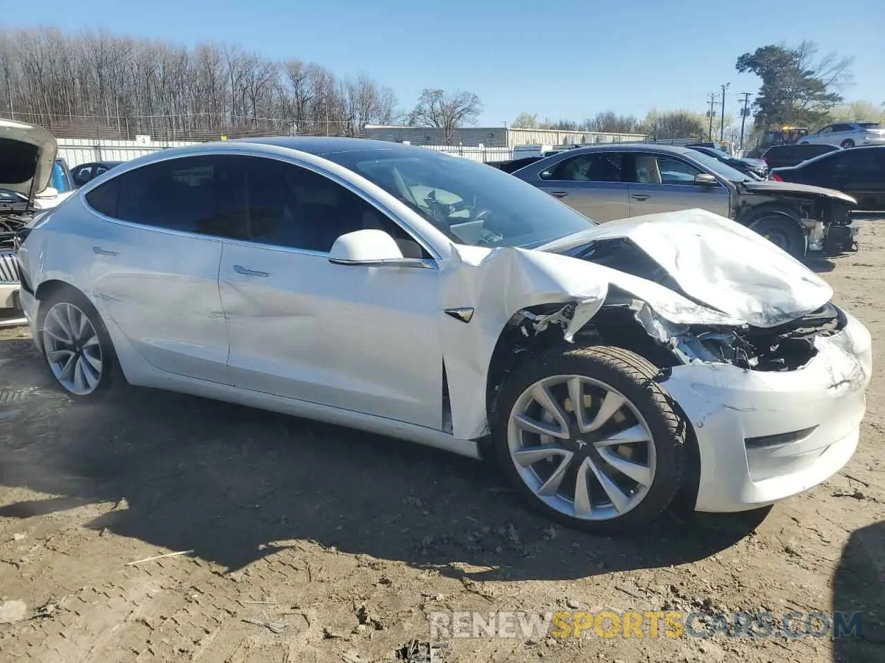4 Photograph of a damaged car 5YJ3E1EA8LF743856 TESLA MODEL 3 2020