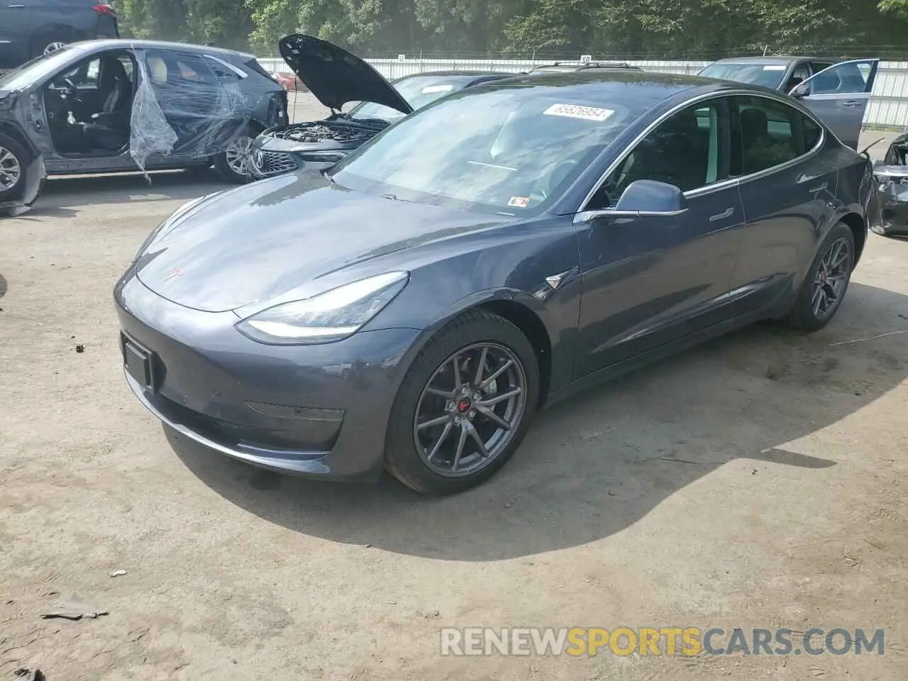 1 Photograph of a damaged car 5YJ3E1EA9LF597208 TESLA MODEL 3 2020
