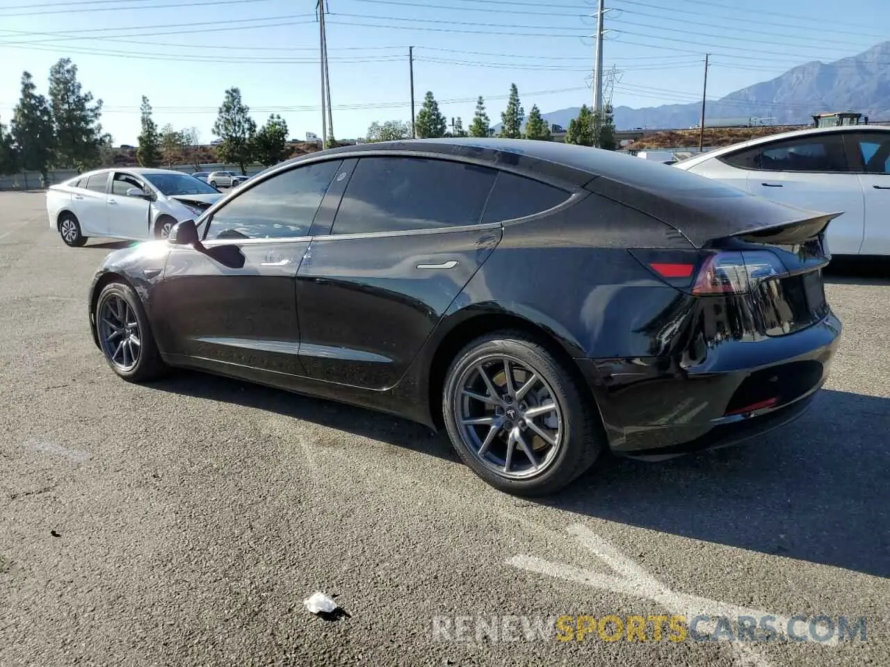 2 Photograph of a damaged car 5YJ3E1EB0LF600134 TESLA MODEL 3 2020