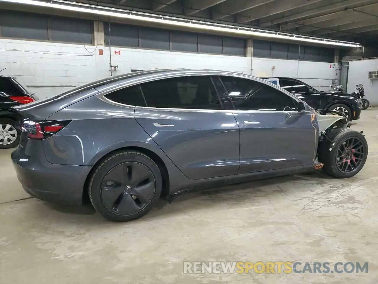 3 Photograph of a damaged car 5YJ3E1EB0LF640052 TESLA MODEL 3 2020