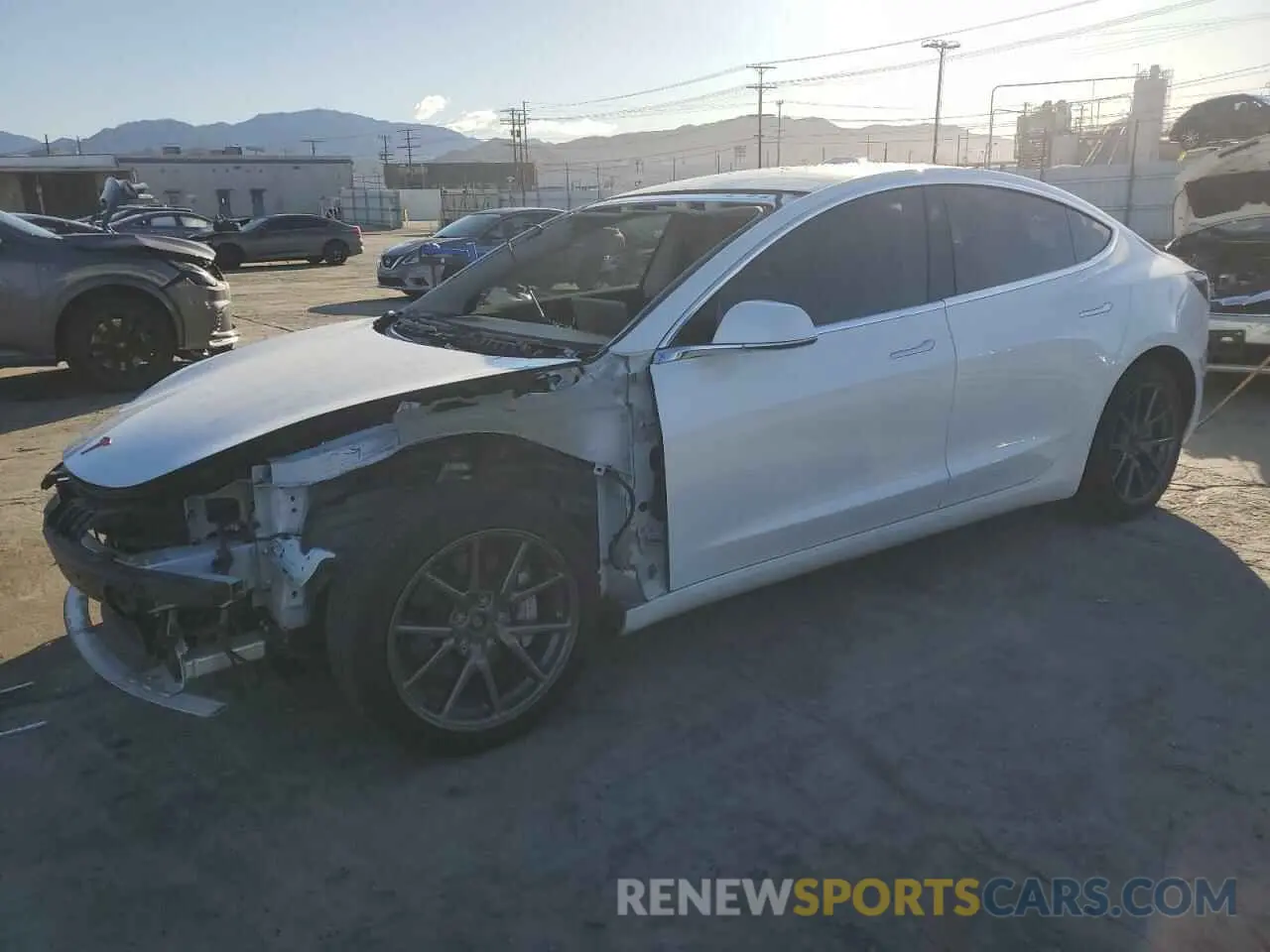 1 Photograph of a damaged car 5YJ3E1EB0LF665887 TESLA MODEL 3 2020