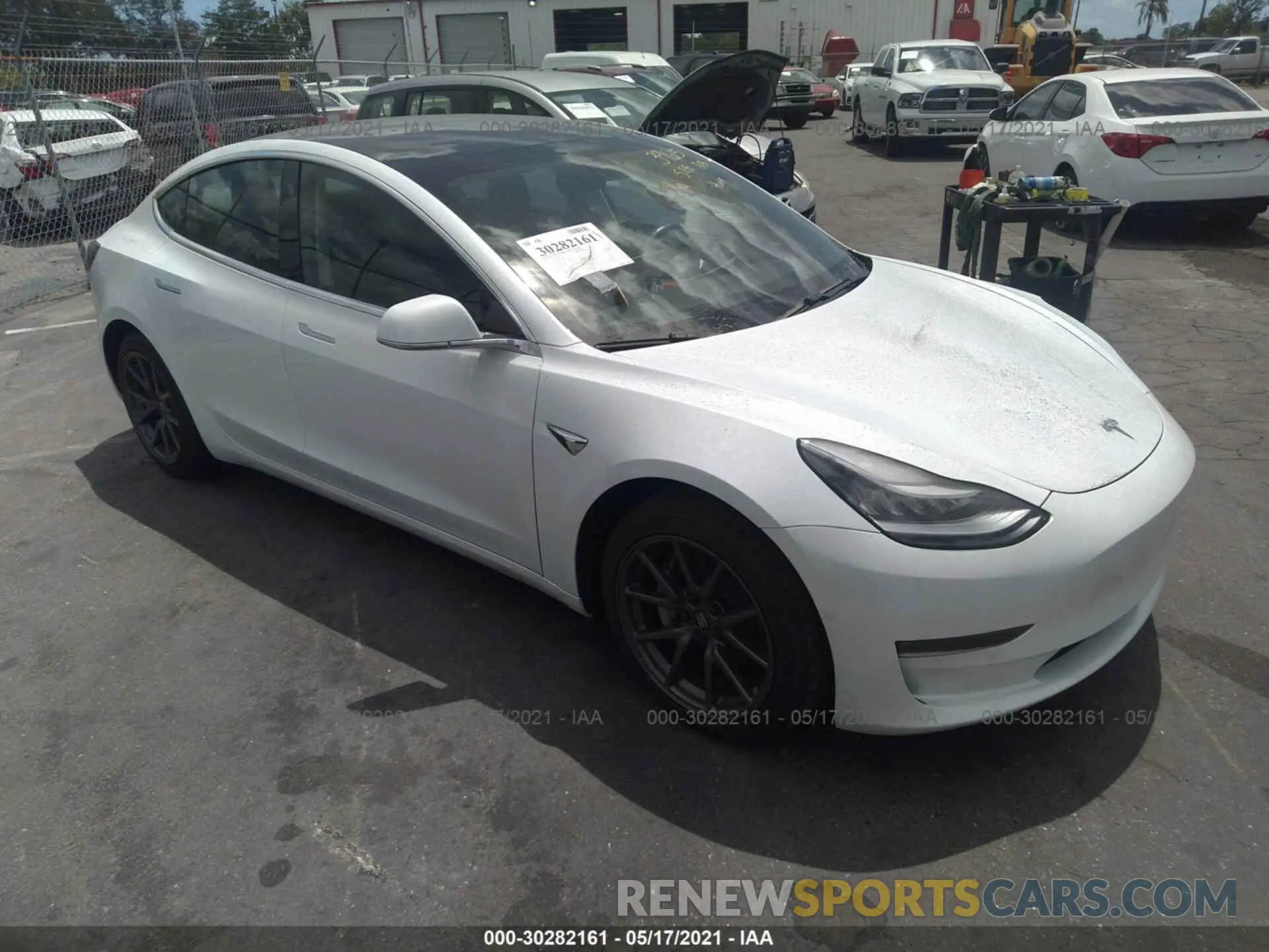 1 Photograph of a damaged car 5YJ3E1EB0LF711458 TESLA MODEL 3 2020