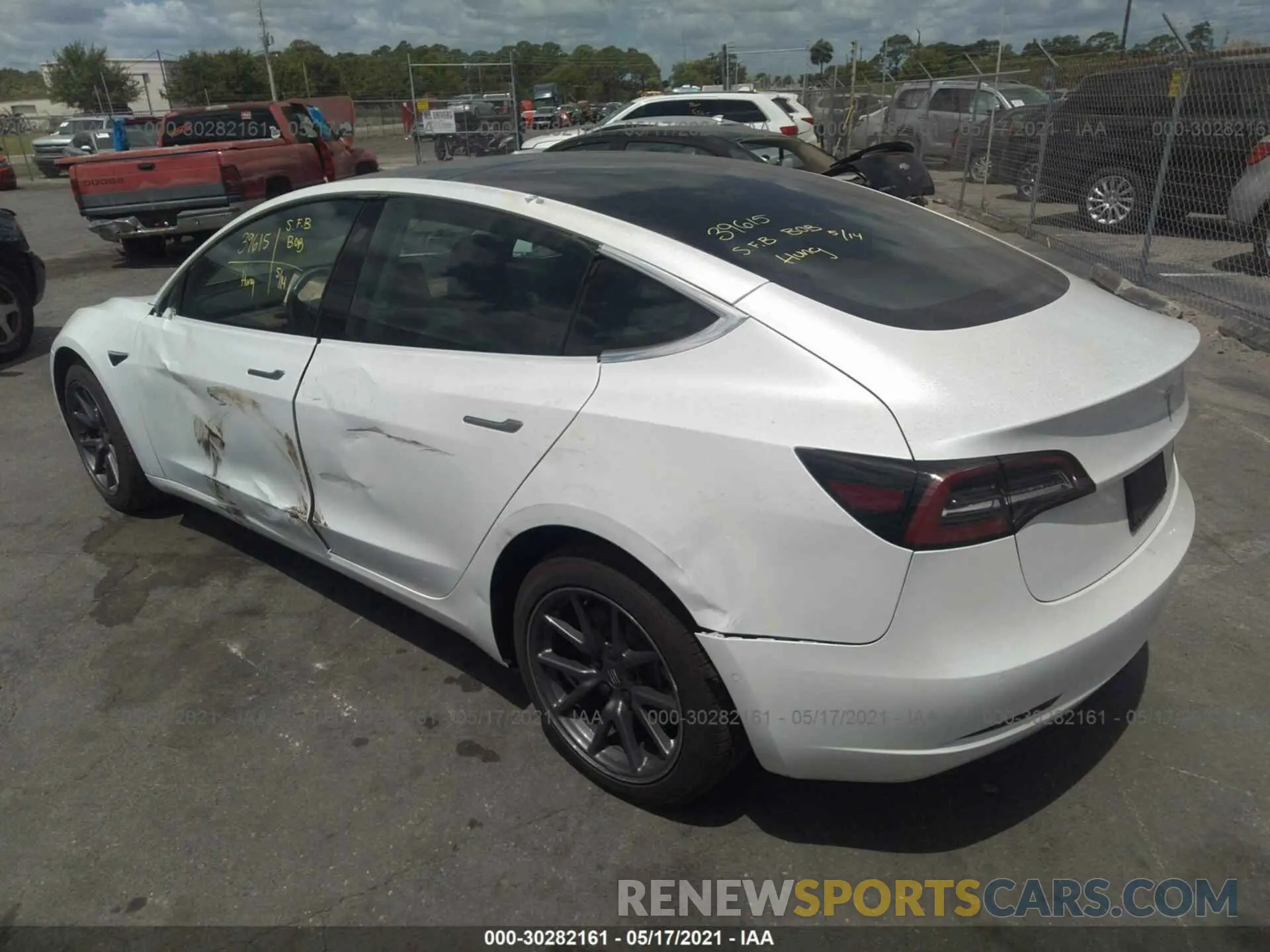 3 Photograph of a damaged car 5YJ3E1EB0LF711458 TESLA MODEL 3 2020