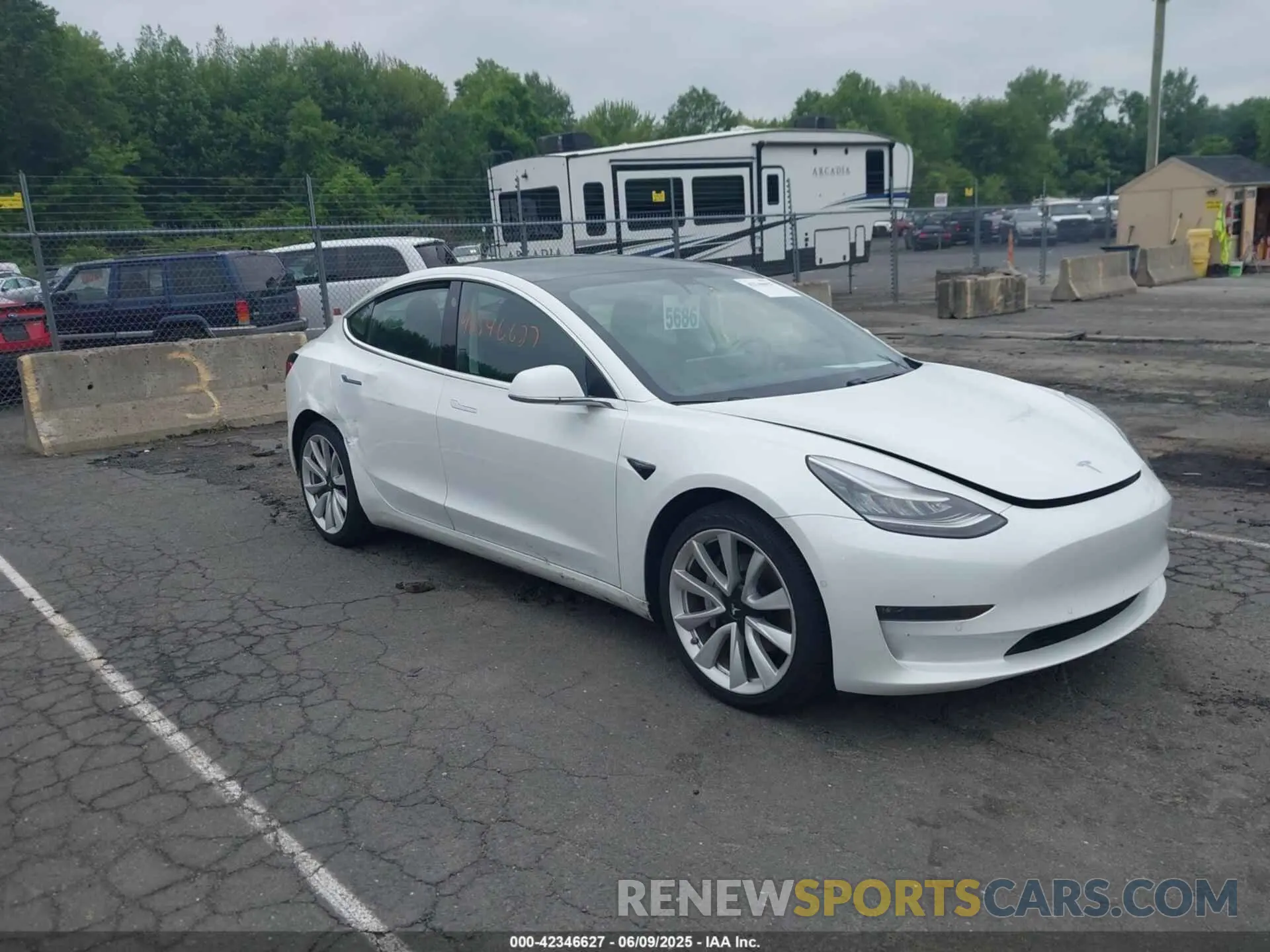 1 Photograph of a damaged car 5YJ3E1EB0LF795524 TESLA MODEL 3 2020