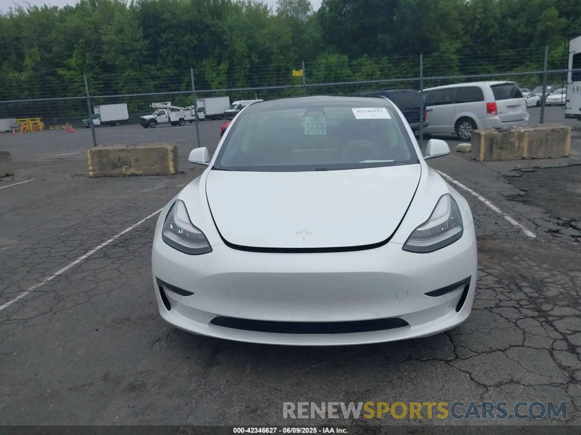 12 Photograph of a damaged car 5YJ3E1EB0LF795524 TESLA MODEL 3 2020