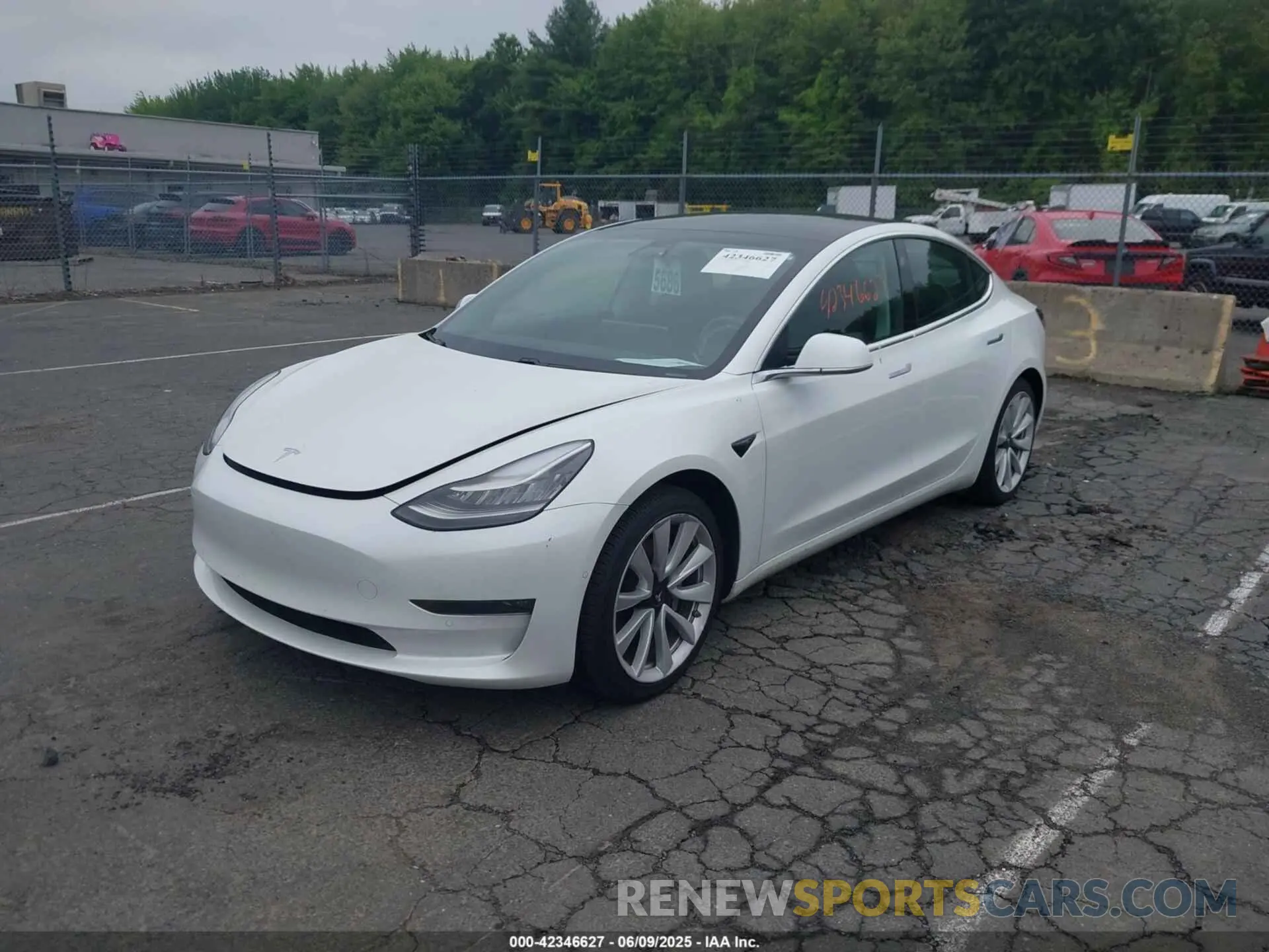 2 Photograph of a damaged car 5YJ3E1EB0LF795524 TESLA MODEL 3 2020
