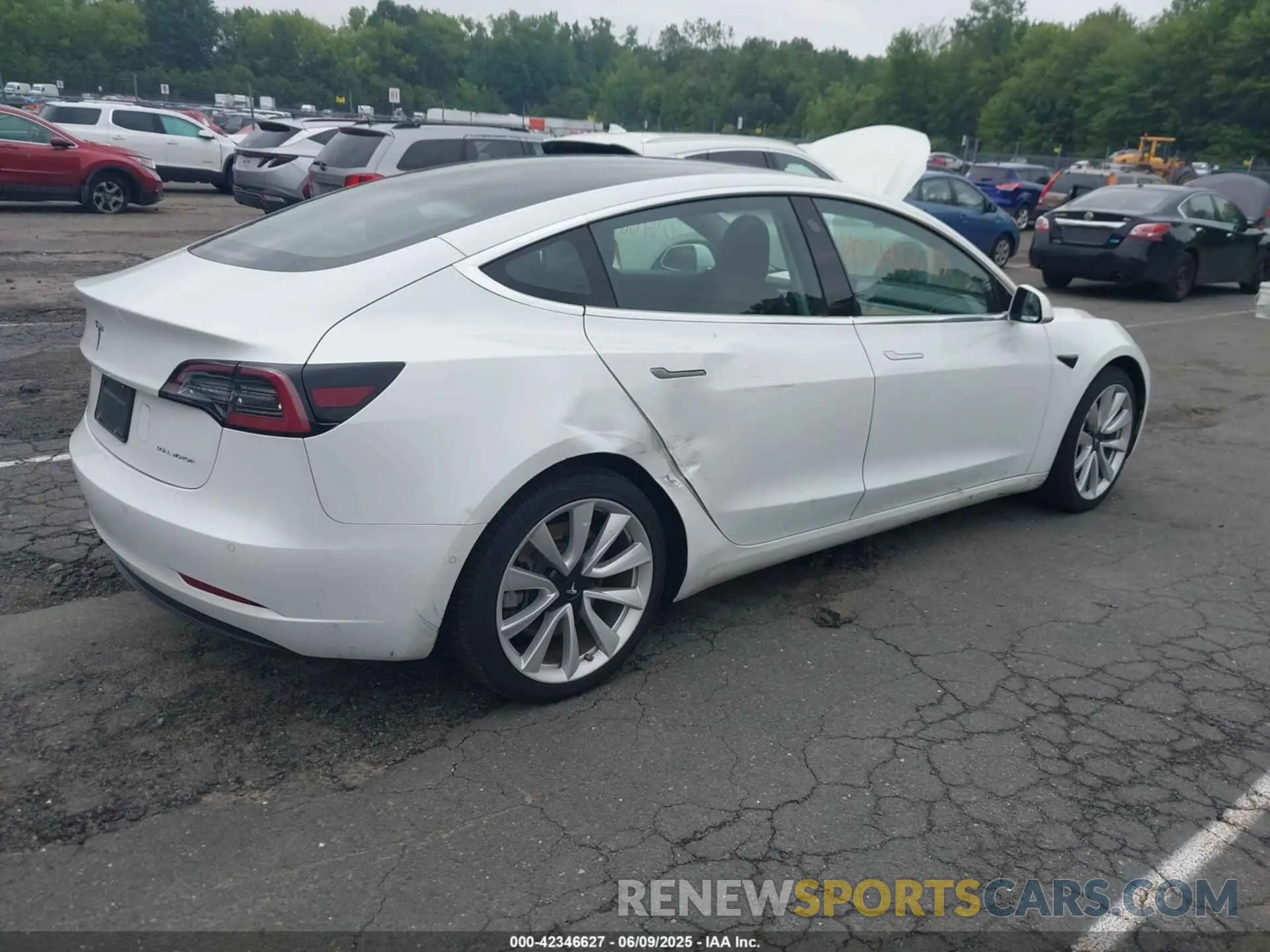 4 Photograph of a damaged car 5YJ3E1EB0LF795524 TESLA MODEL 3 2020