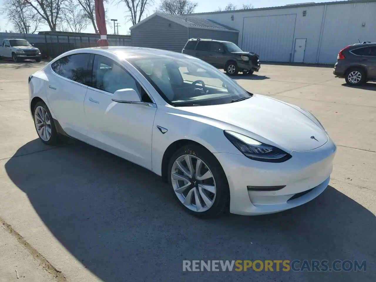 4 Photograph of a damaged car 5YJ3E1EB1LF622935 TESLA MODEL 3 2020