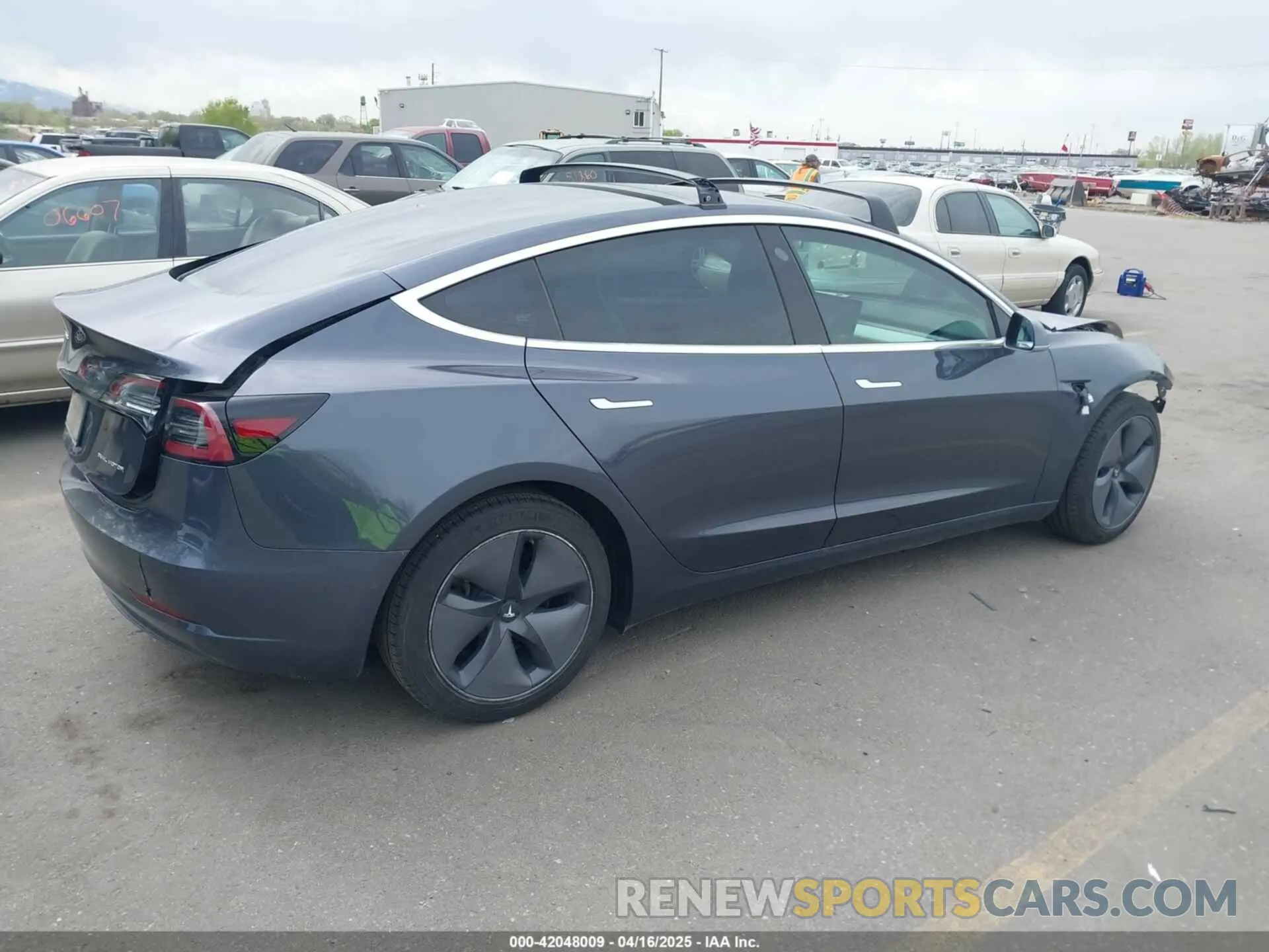4 Photograph of a damaged car 5YJ3E1EB1LF639055 TESLA MODEL 3 2020