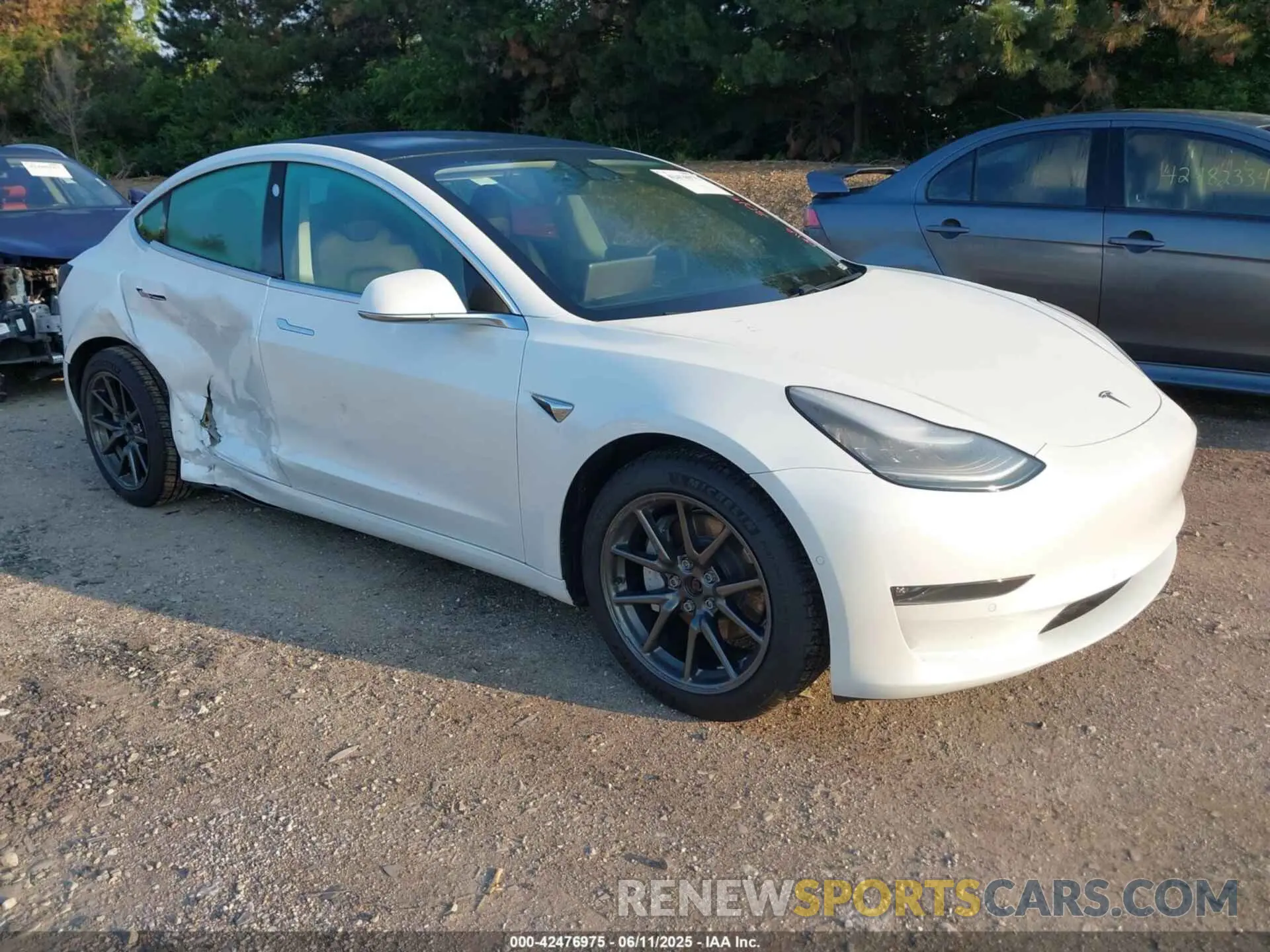 1 Photograph of a damaged car 5YJ3E1EB1LF665106 TESLA MODEL 3 2020