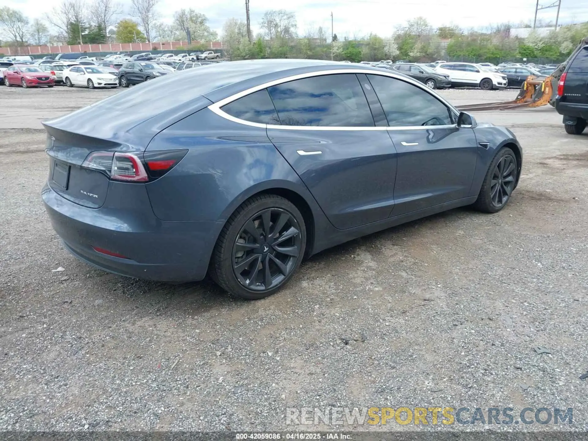 4 Photograph of a damaged car 5YJ3E1EB2LF646449 TESLA MODEL 3 2020