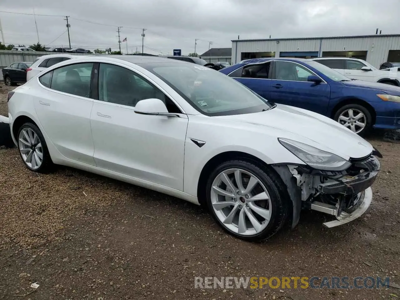 4 Photograph of a damaged car 5YJ3E1EB3LF667522 TESLA MODEL 3 2020