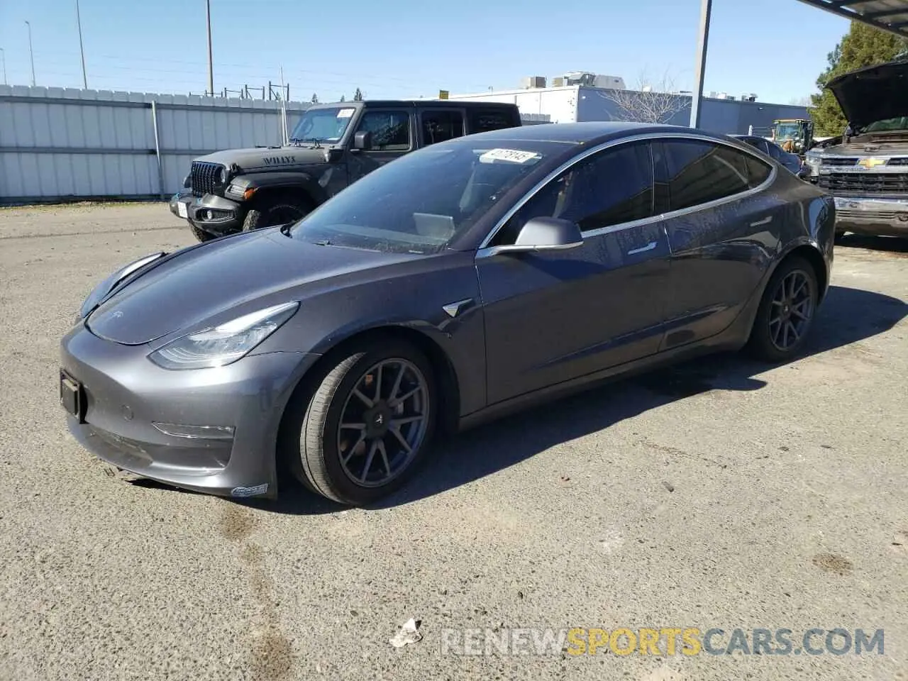1 Photograph of a damaged car 5YJ3E1EB3LF734913 TESLA MODEL 3 2020