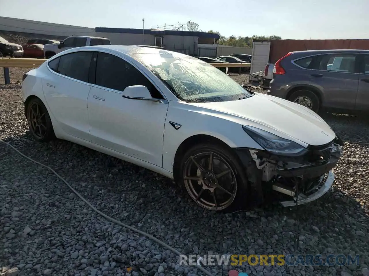 4 Photograph of a damaged car 5YJ3E1EB3LF787644 TESLA MODEL 3 2020
