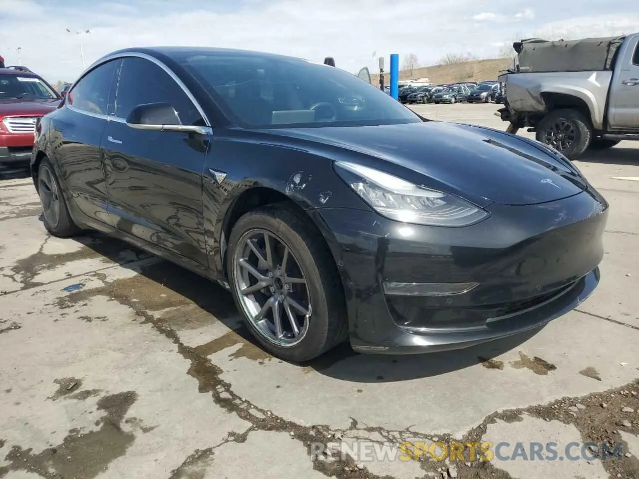 4 Фотография поврежденного автомобиля 5YJ3E1EB4LF599909 TESLA MODEL 3 2020