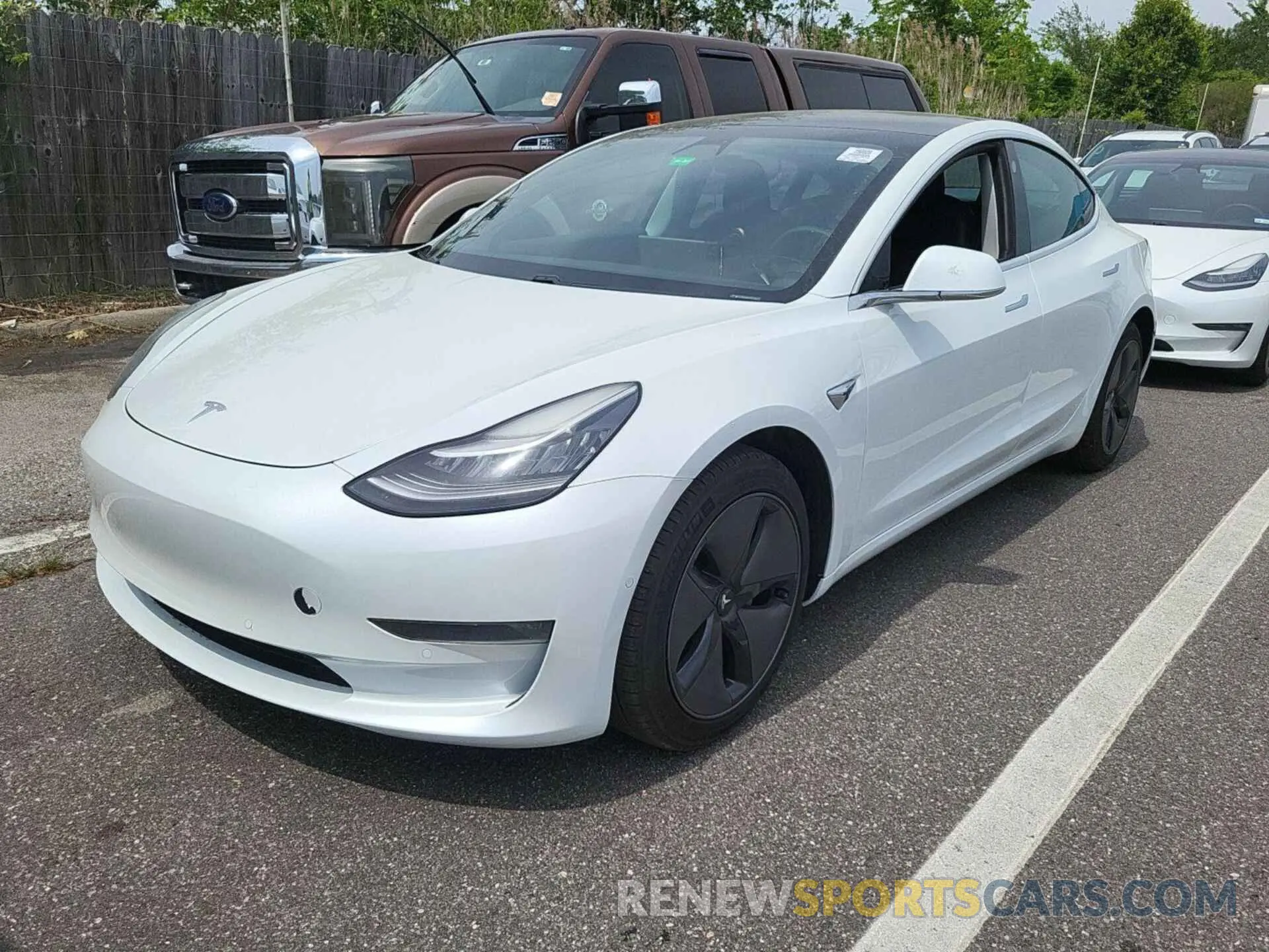 27 Photograph of a damaged car 5YJ3E1EB4LF637784 TESLA MODEL 3 2020