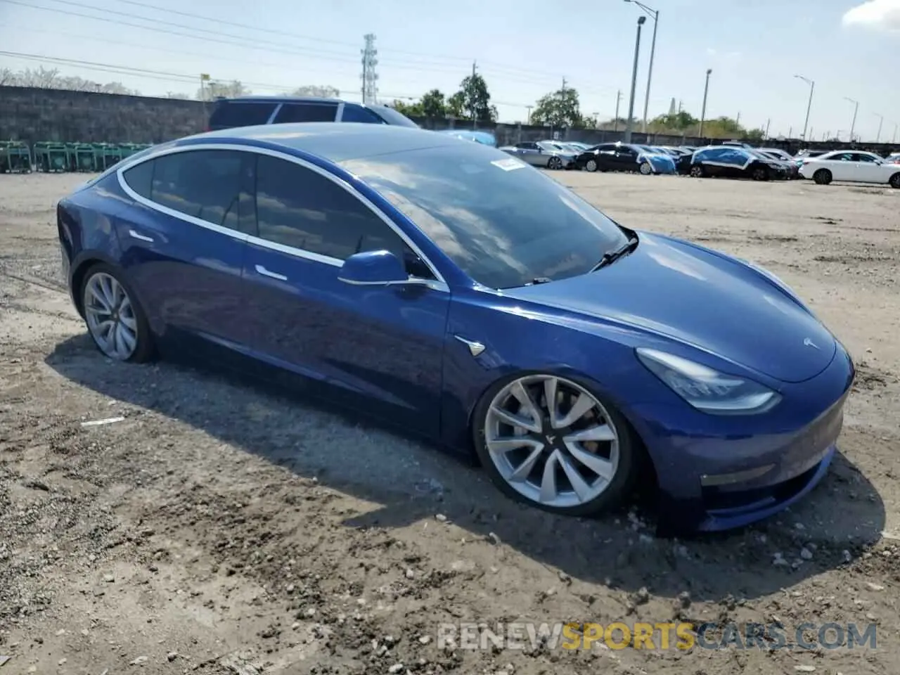 4 Photograph of a damaged car 5YJ3E1EB4LF744575 TESLA MODEL 3 2020