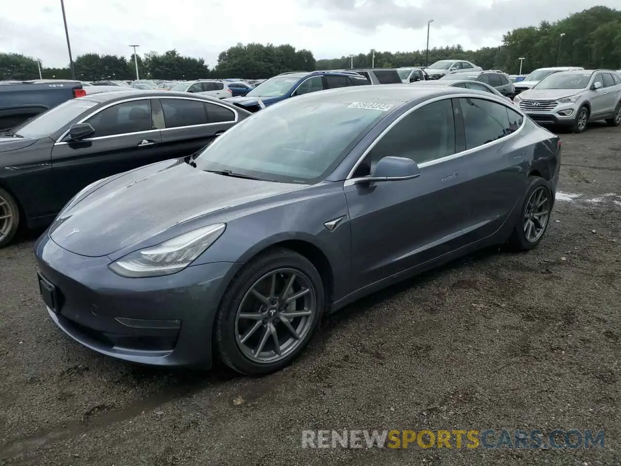 1 Photograph of a damaged car 5YJ3E1EB5LF635185 TESLA MODEL 3 2020