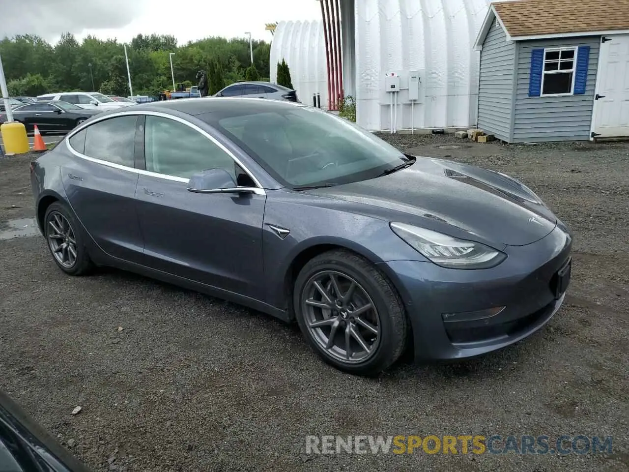 4 Photograph of a damaged car 5YJ3E1EB5LF635185 TESLA MODEL 3 2020