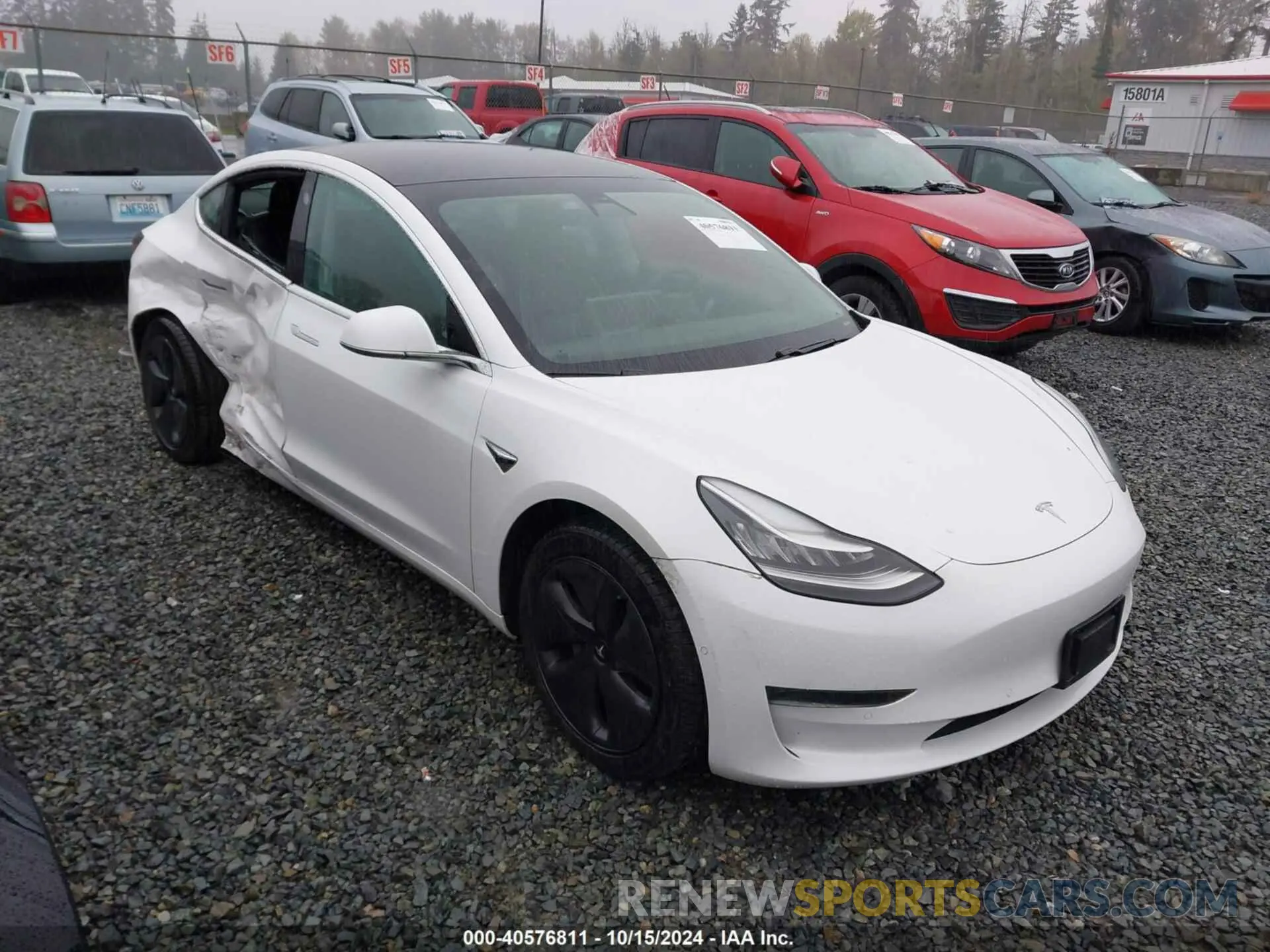 1 Photograph of a damaged car 5YJ3E1EB6LF636698 TESLA MODEL 3 2020